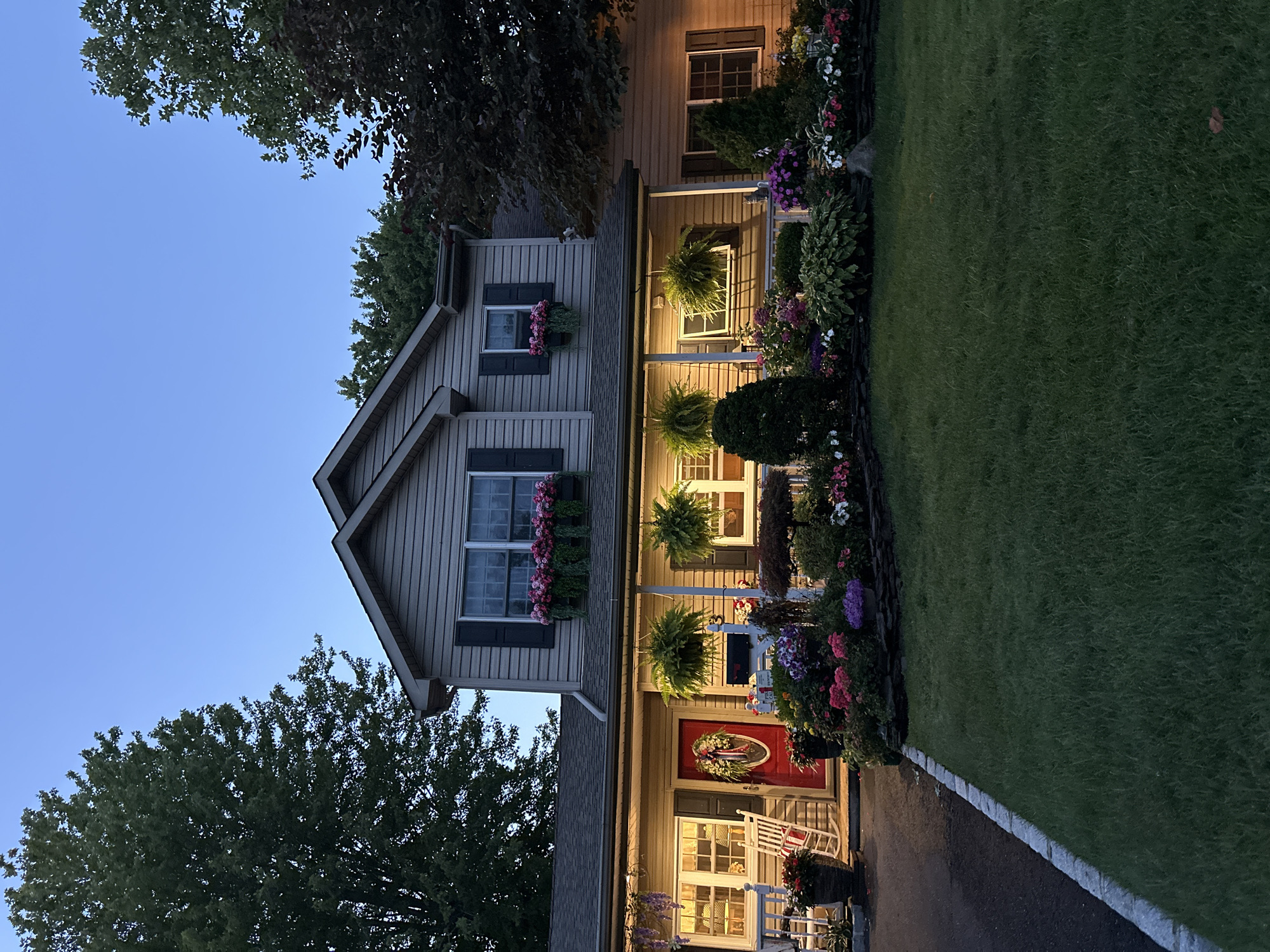 Tesla Cybertruck parked outside a Wantagh home at dusk