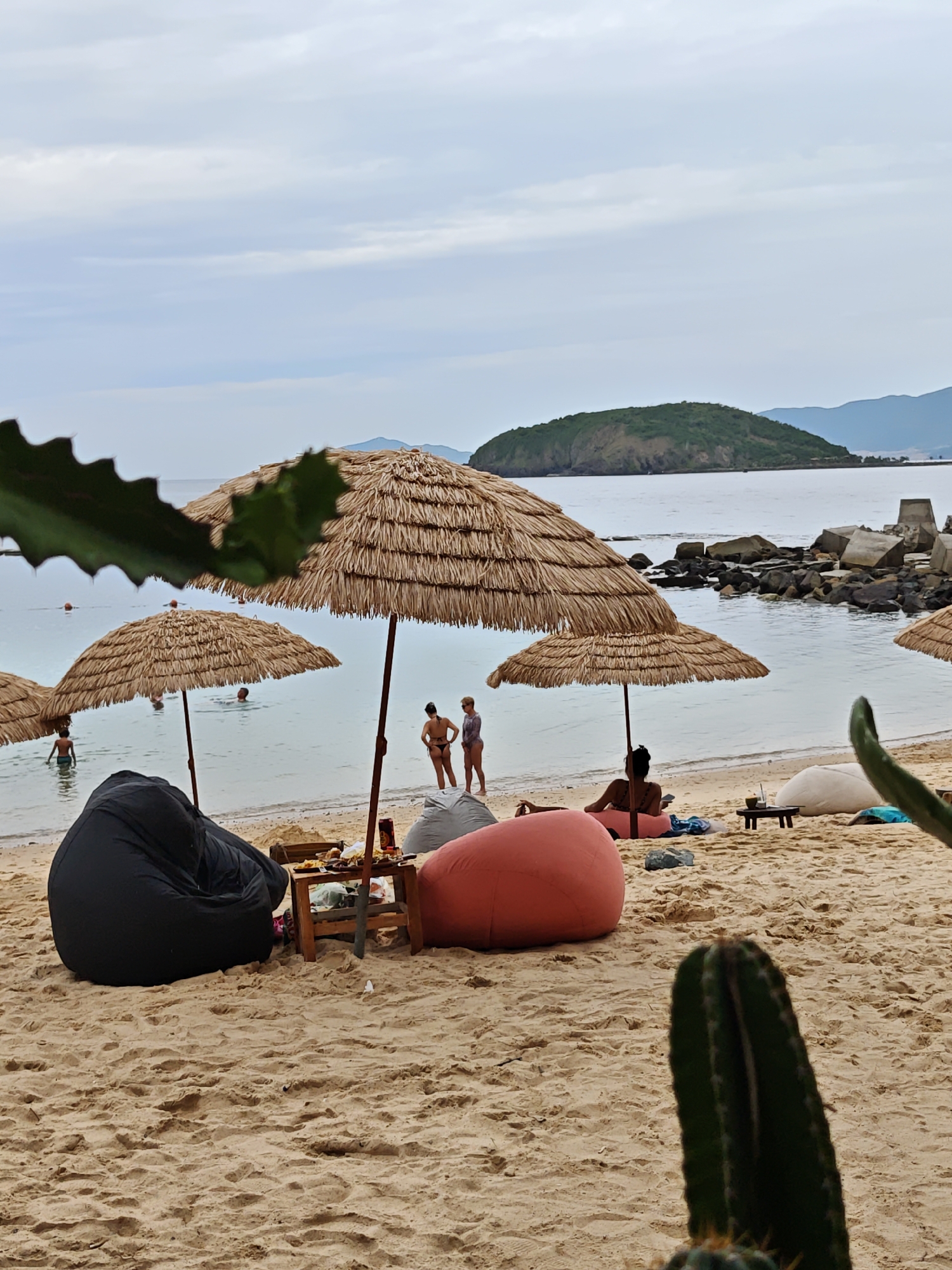 Chill beach morning in Nha Trang: sand, shade, and a DJ set