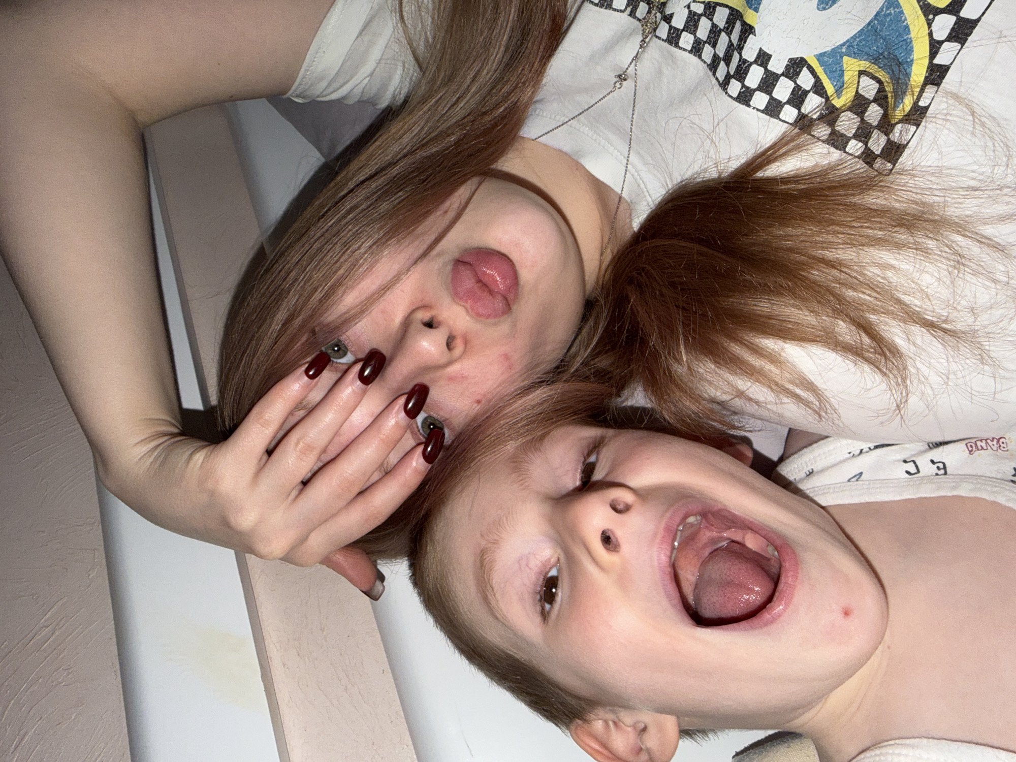 Mother and child captured in casual domestic moments, Rossiyskiy