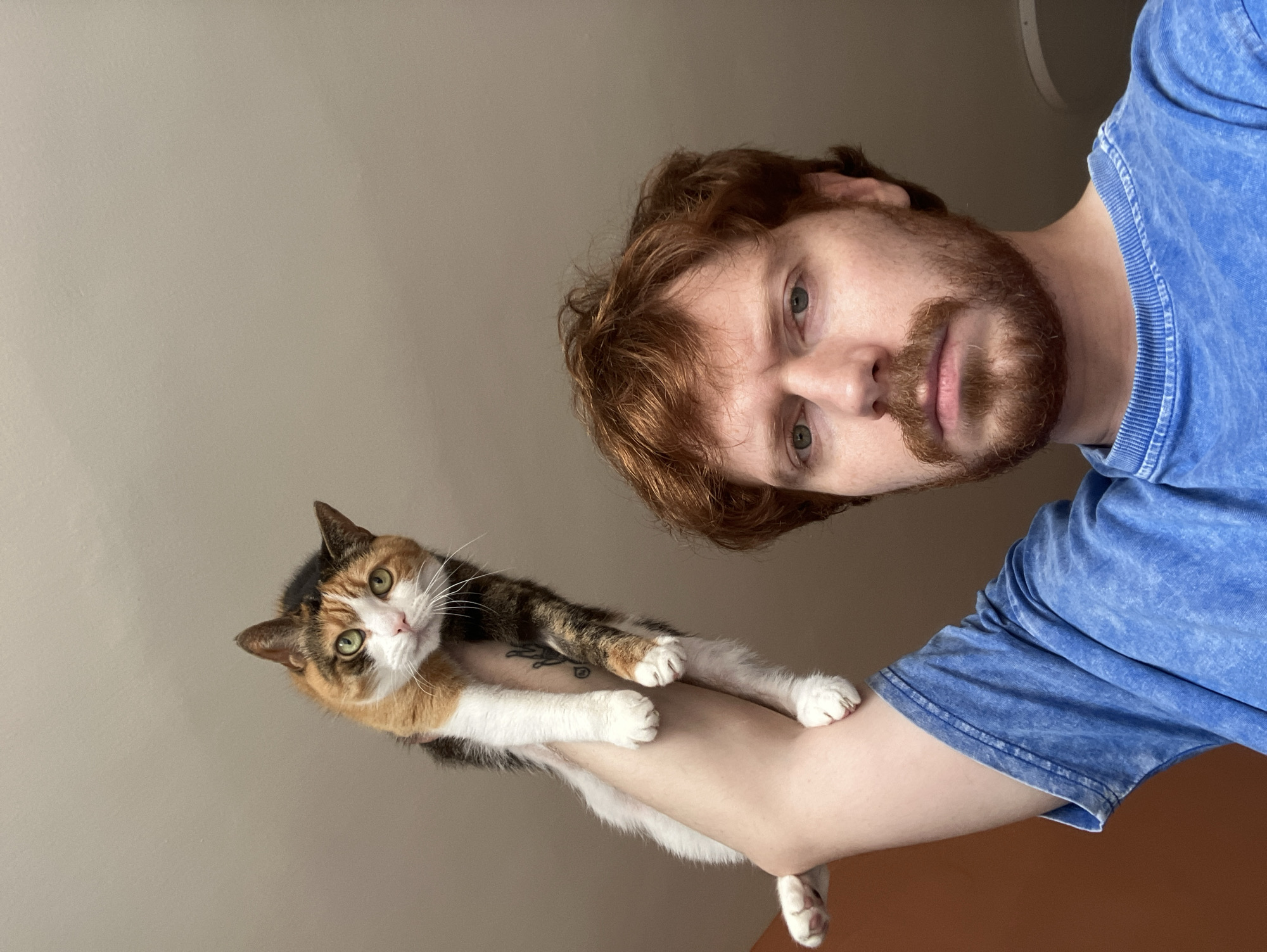 Red-haired man with cat observed in Tel Aviv morning