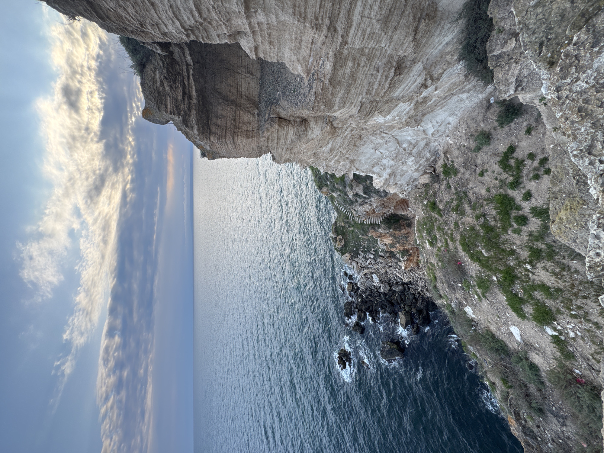 Woman visits clifftop memorial site near Balgarevo, Bulgaria