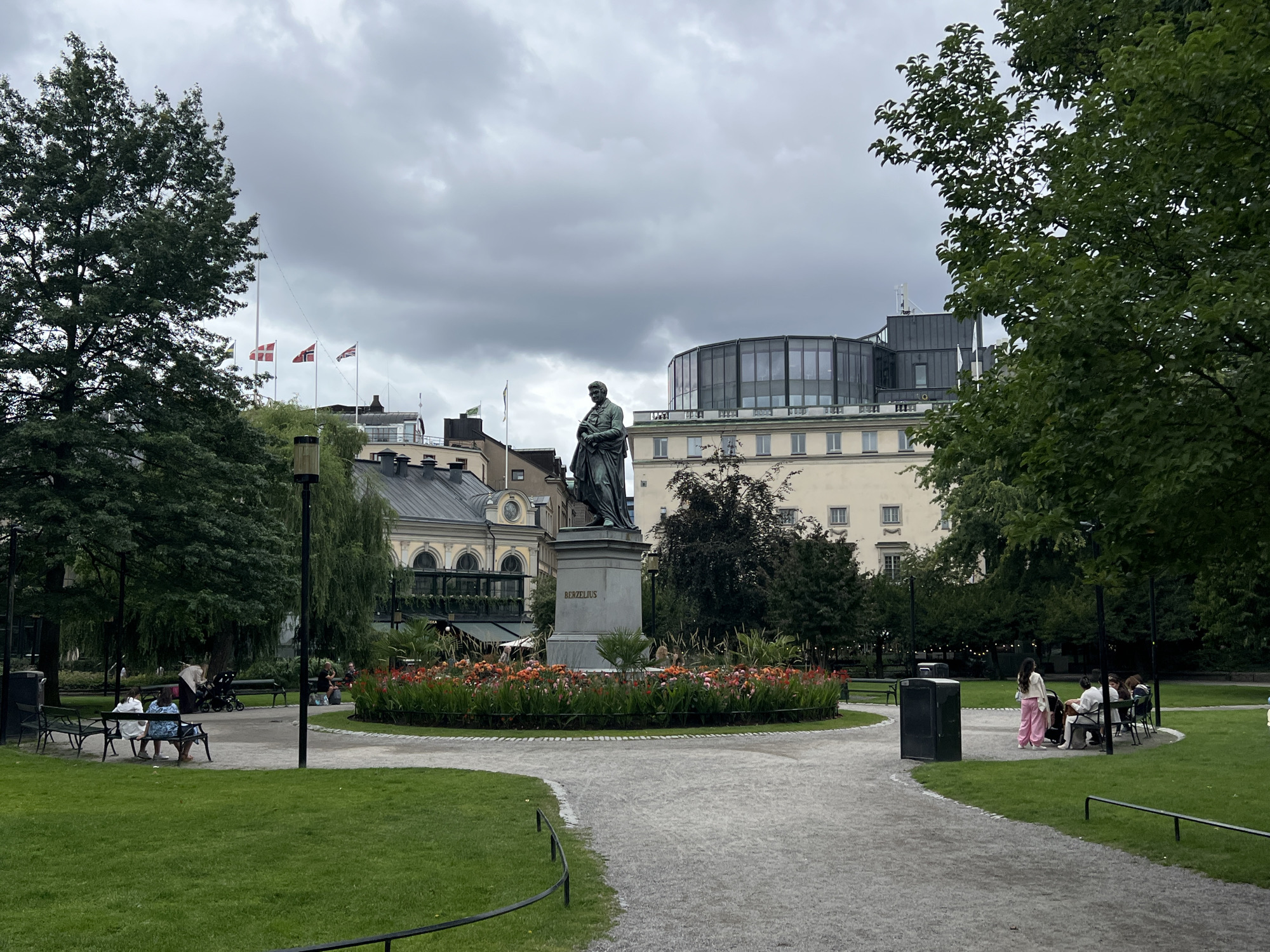 Summer blooms and bronze statues in central Stockholm parks