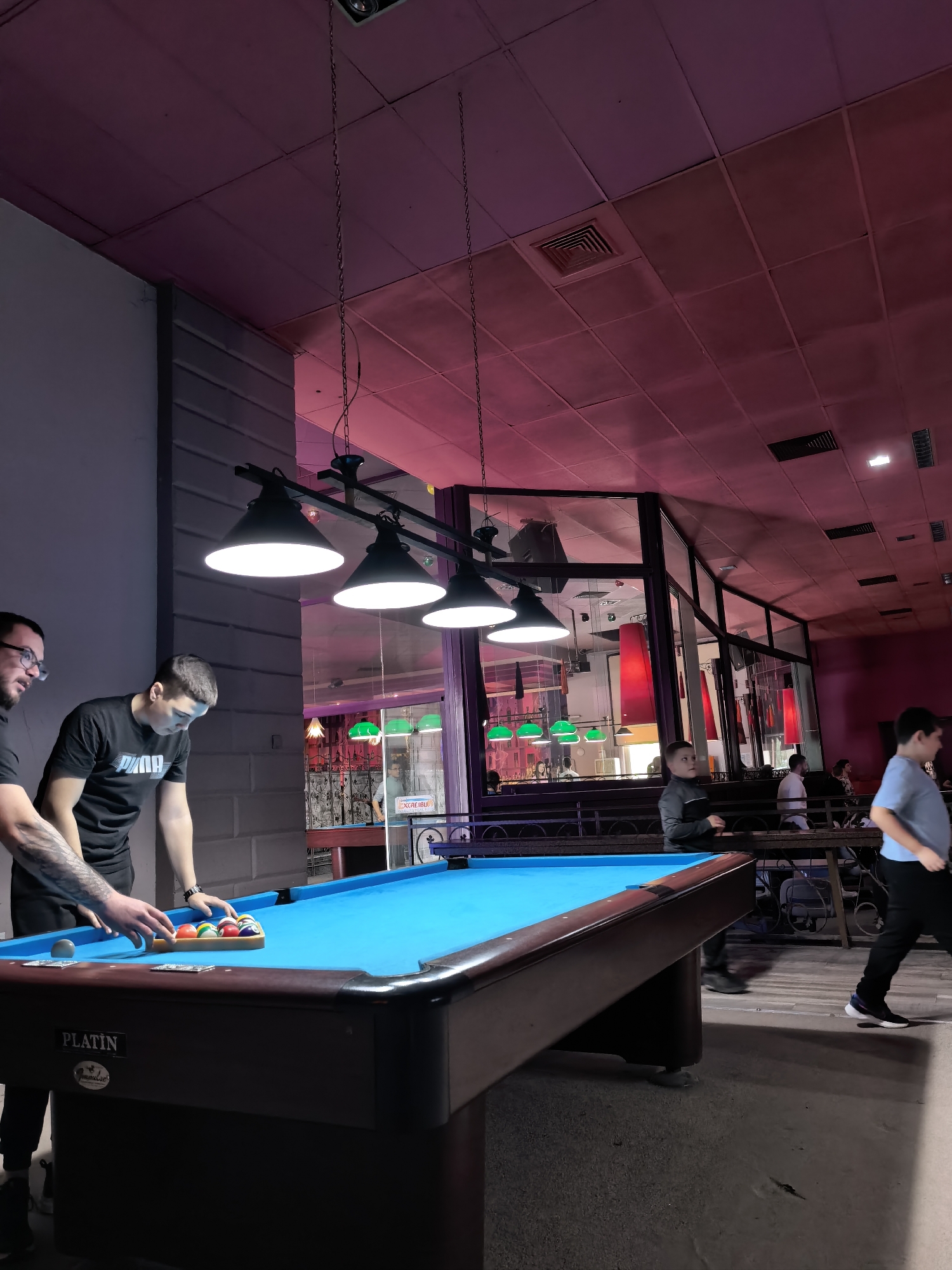Men play pool at recreation center in Plovdiv