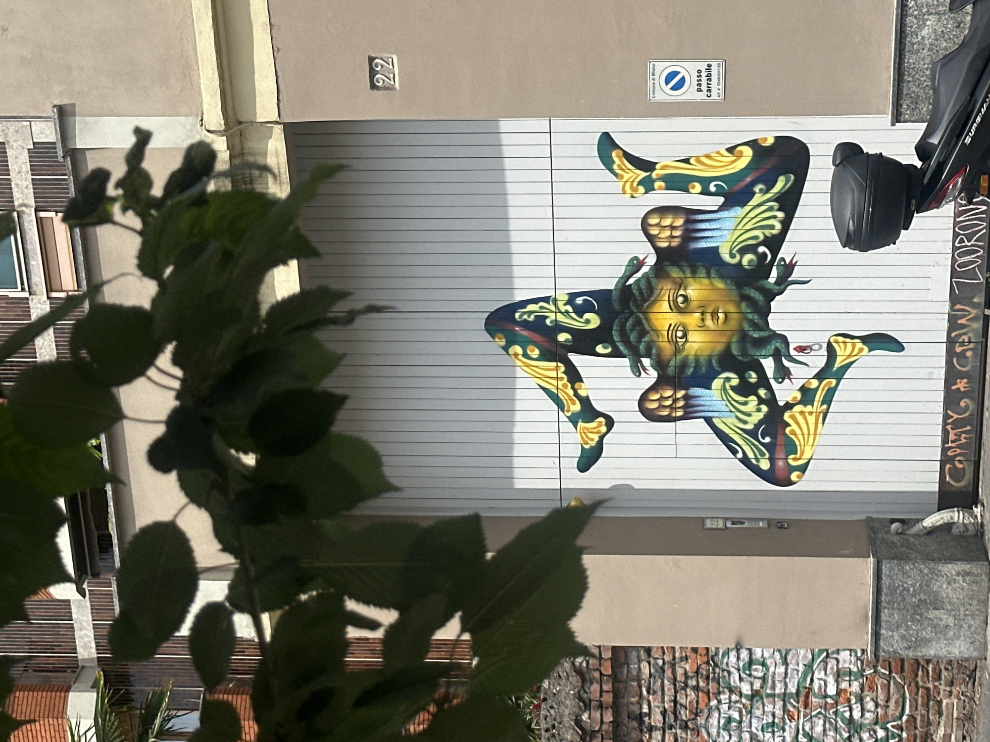 Milan morning walkabout captures street art, architecture, historical coins