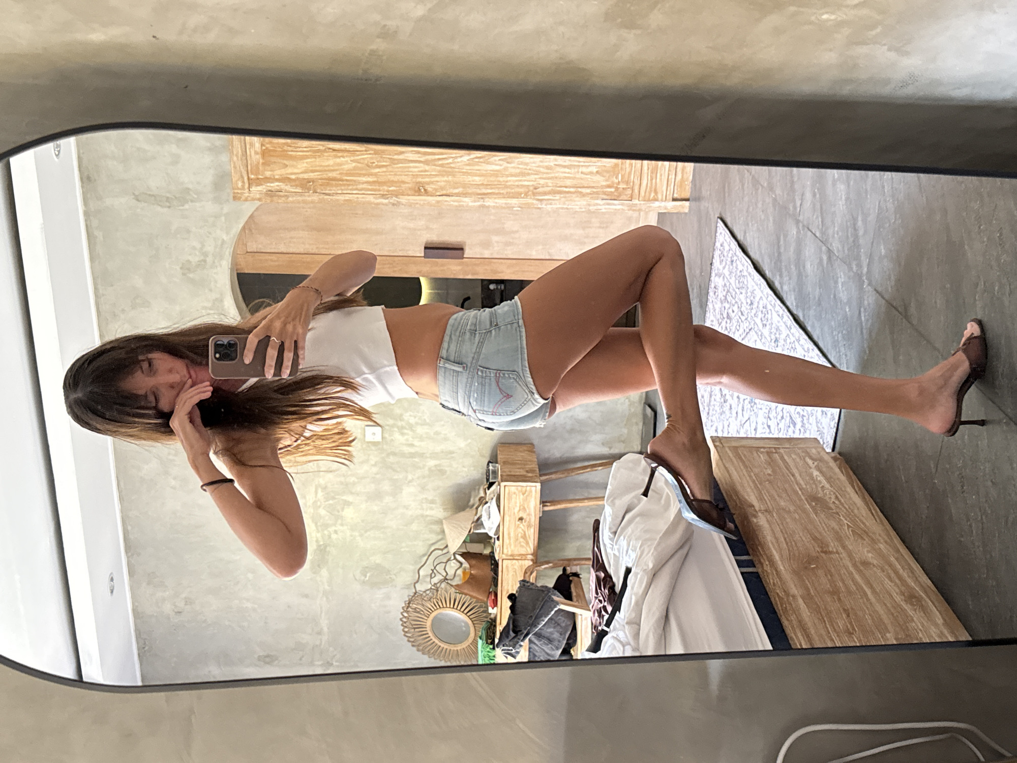 Morning mirror selfies and room details from a North Kuta bedroom