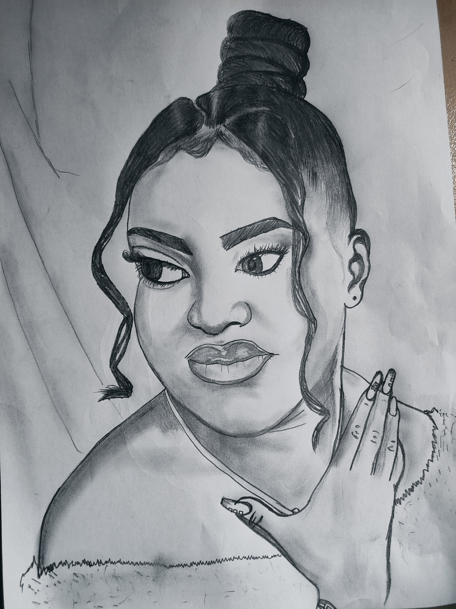 Artist documents portraits and water bottle in Abuja