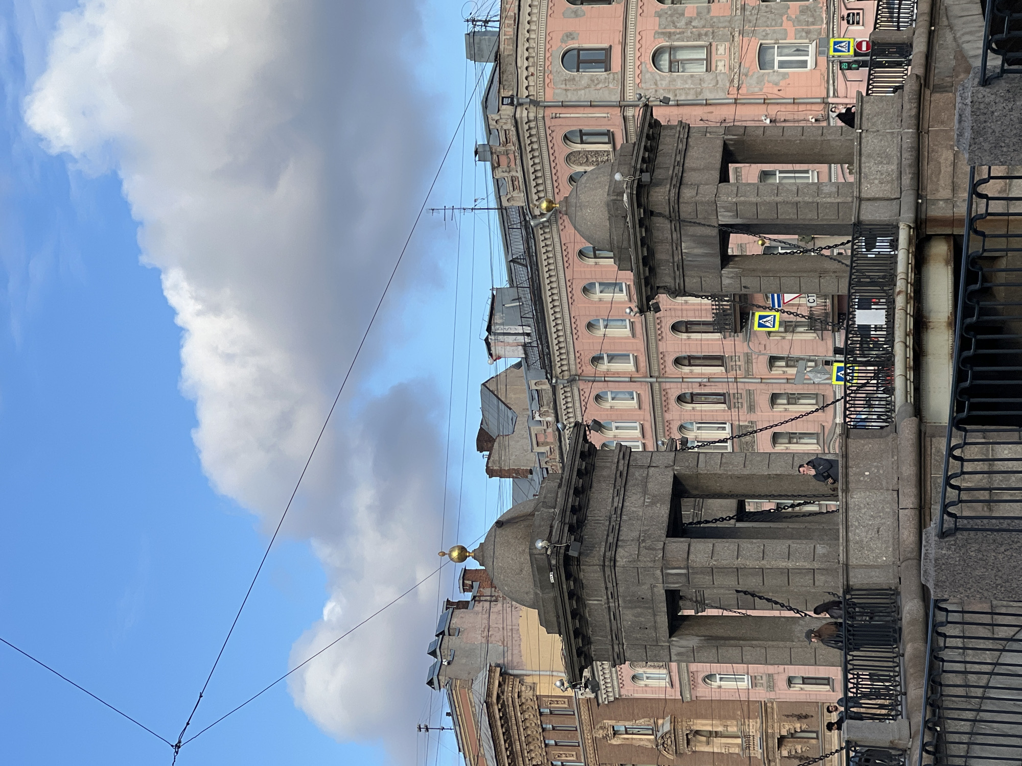 Tourist captures historic Saint Petersburg landmarks during afternoon walk