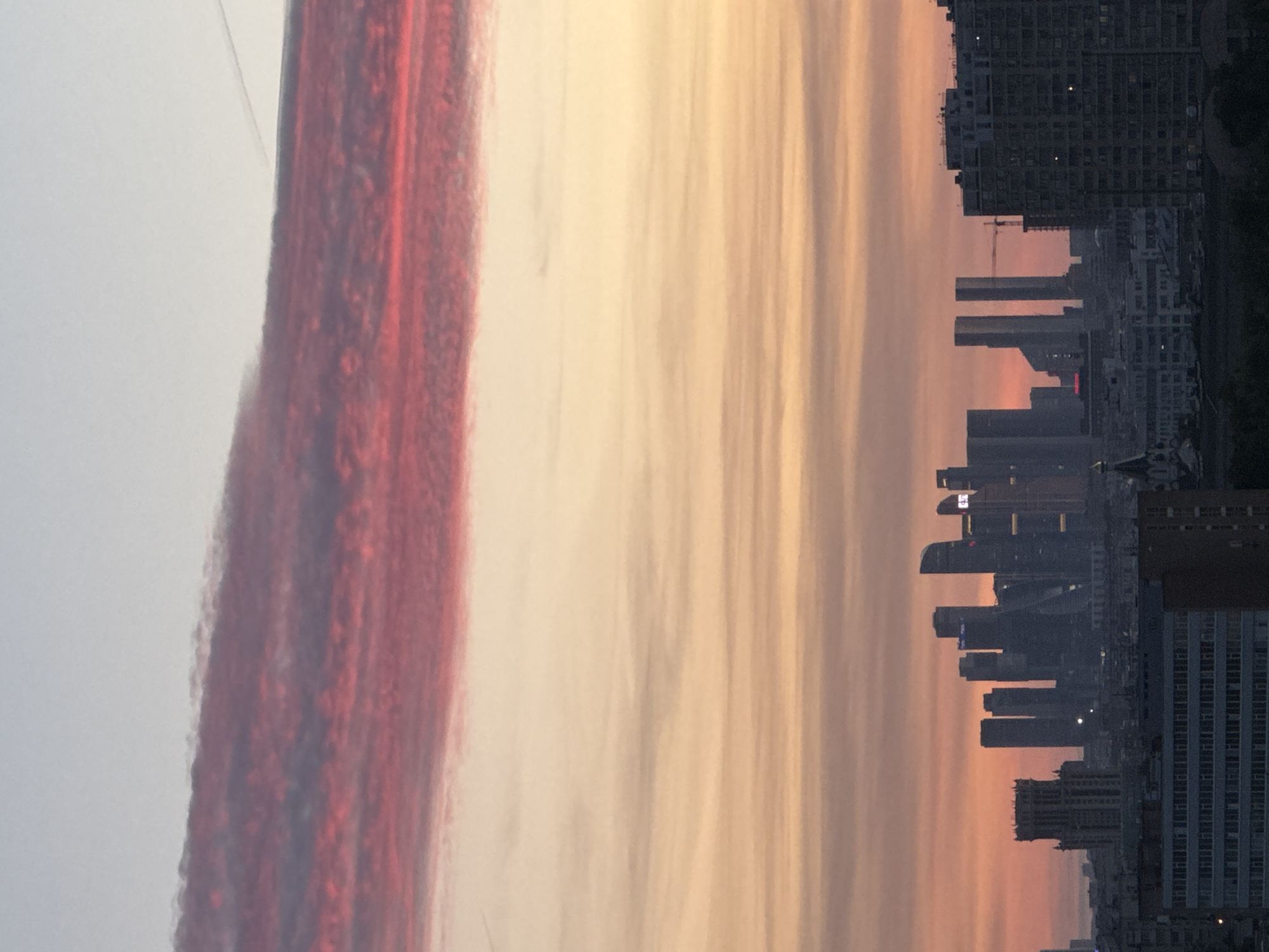 Dramatic sunset cityscape captured from elevated viewpoint in Ukromne