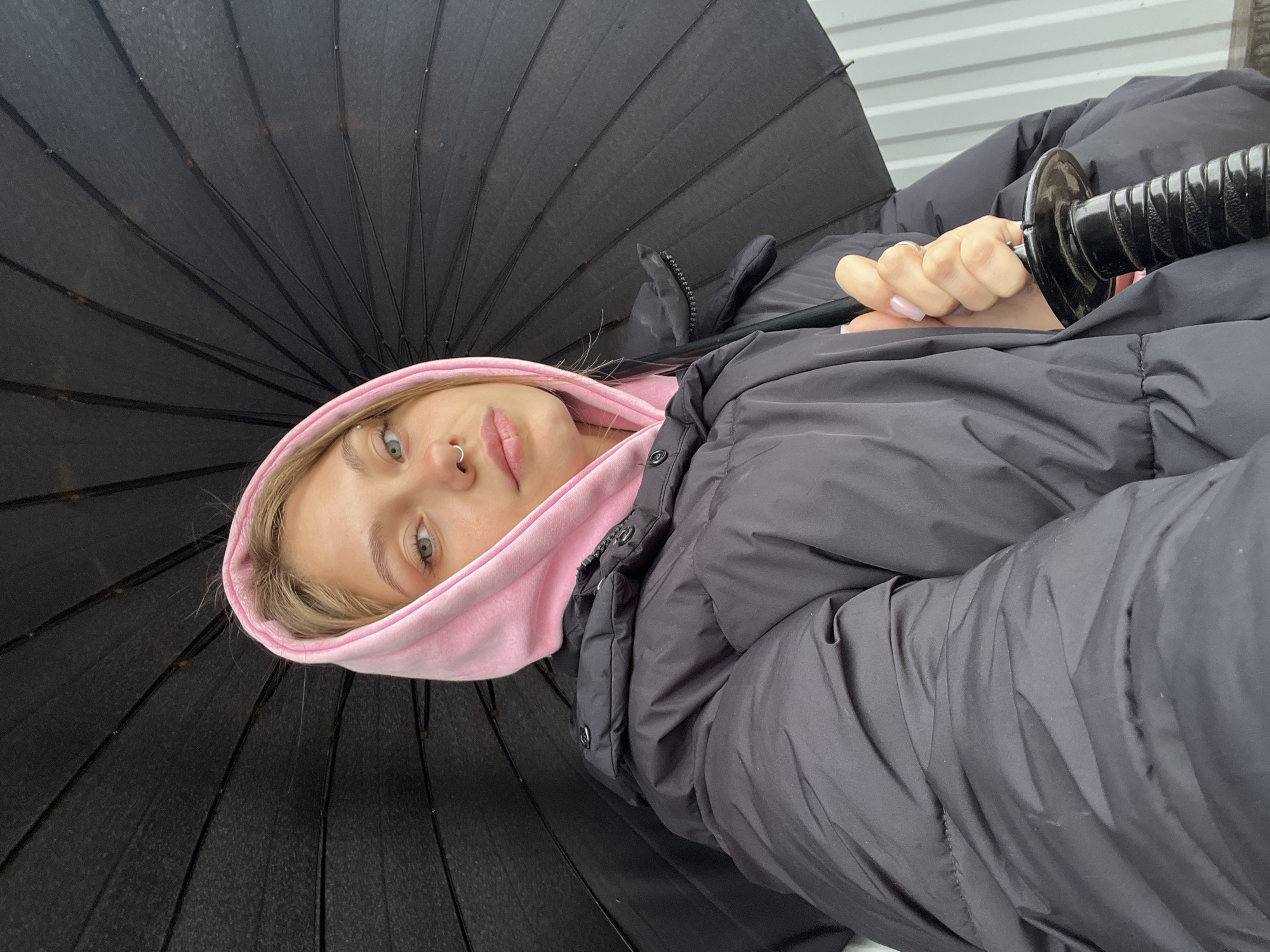 Young woman with umbrella spotted in early morning Foky