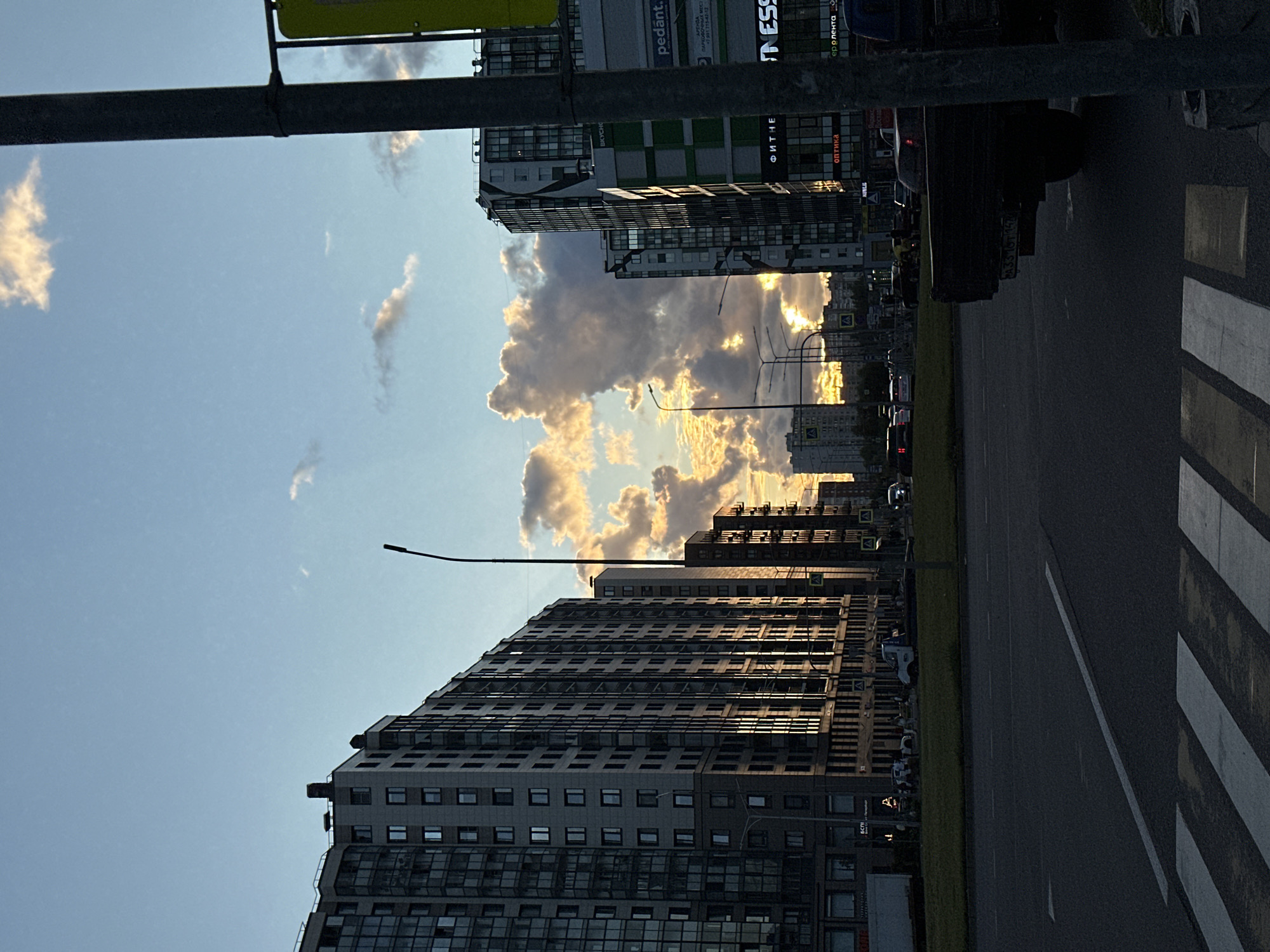 Kudrovo residential streets at dusk, August 2026