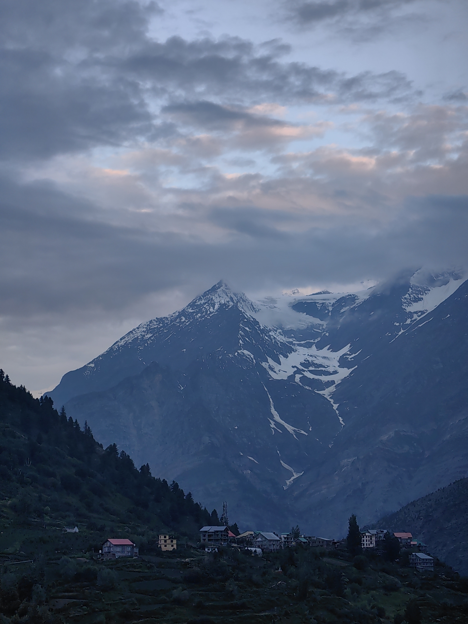 Dusk settles over Keylong's snow-capped Himalayan peaks
