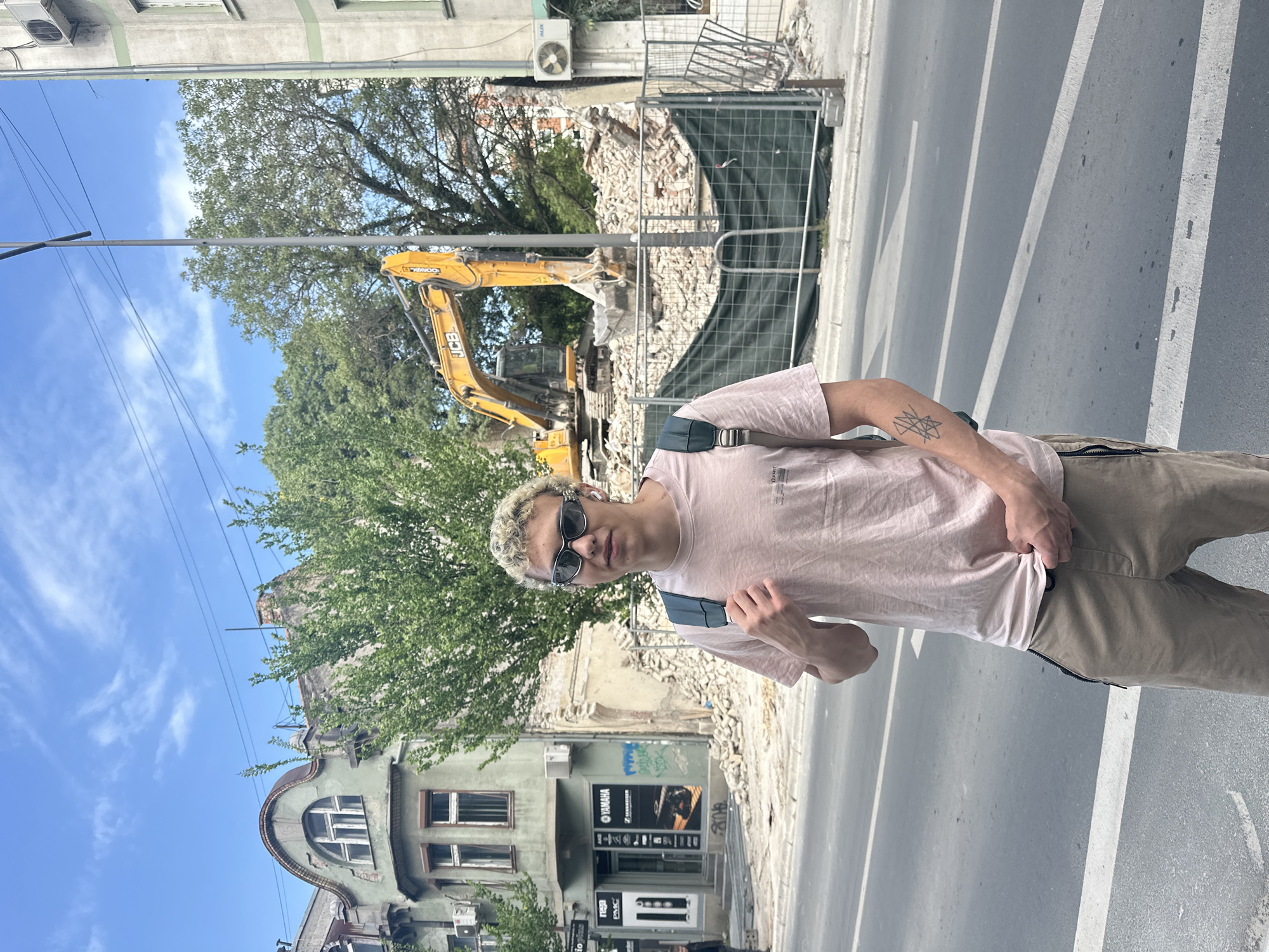 Young man photographed on street in Novi Sad, Serbia