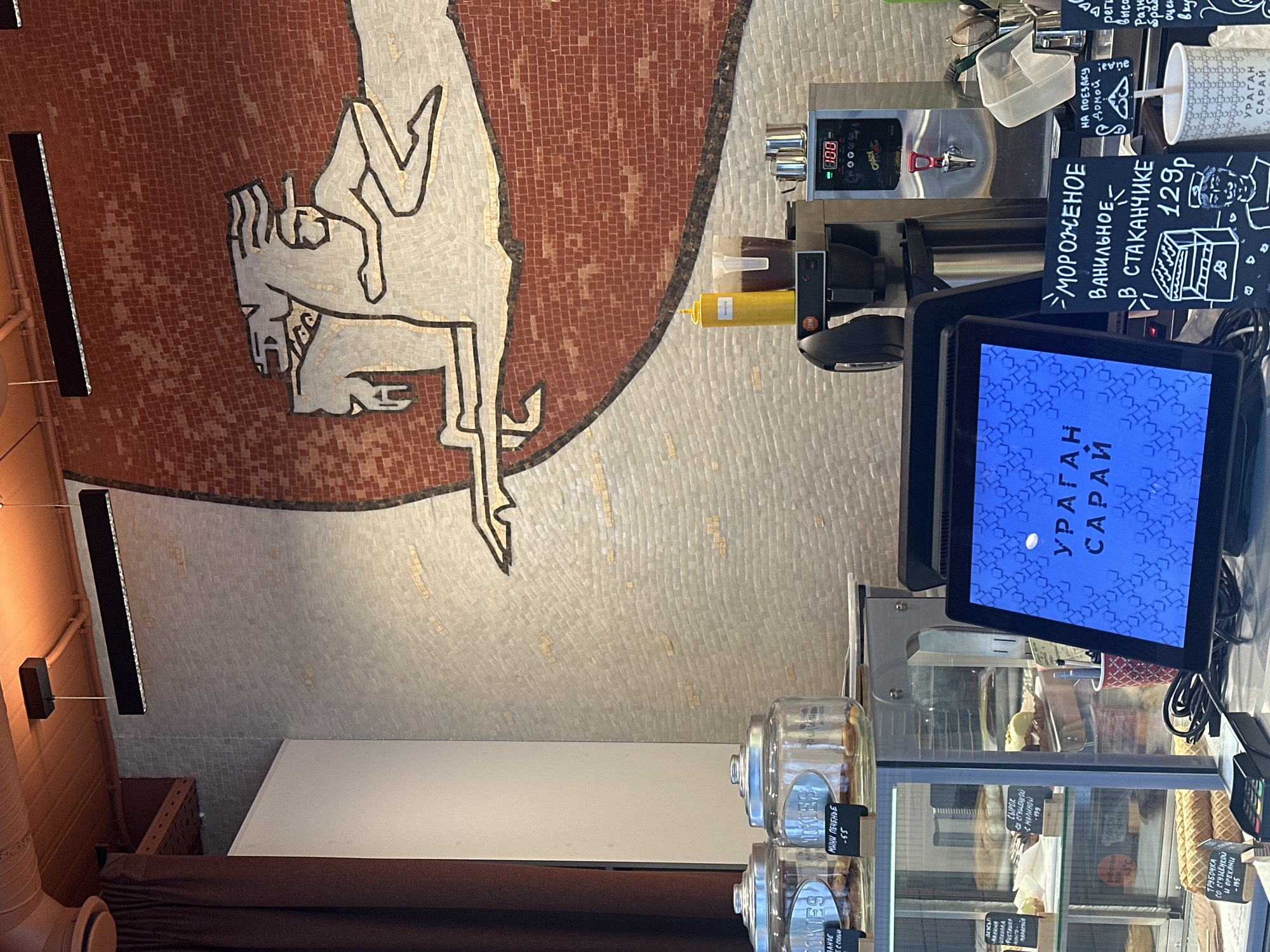 Woman visits cafe counter in Kazan, Russia