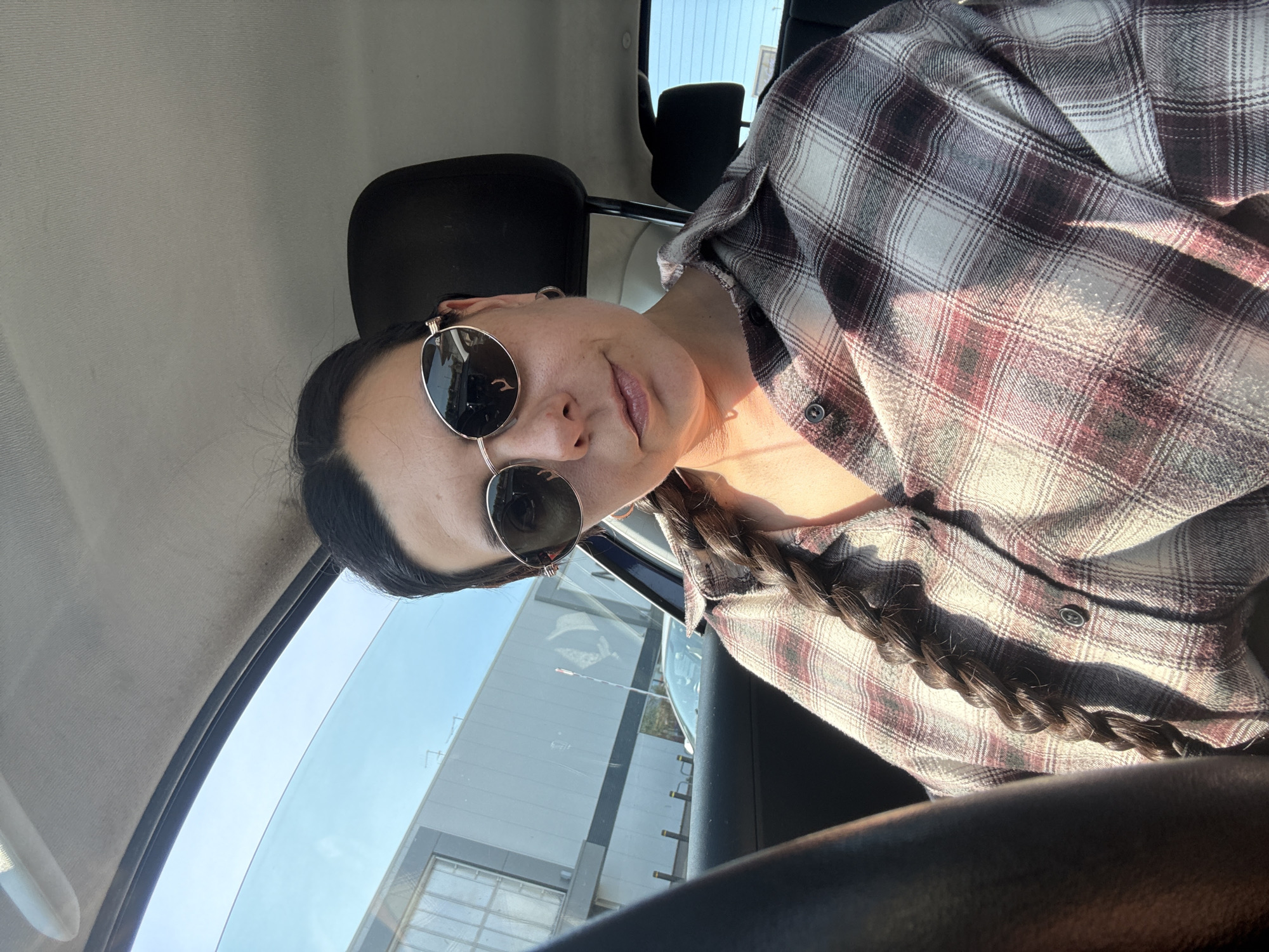 Woman takes selfie in vehicle in Great Yarmouth
