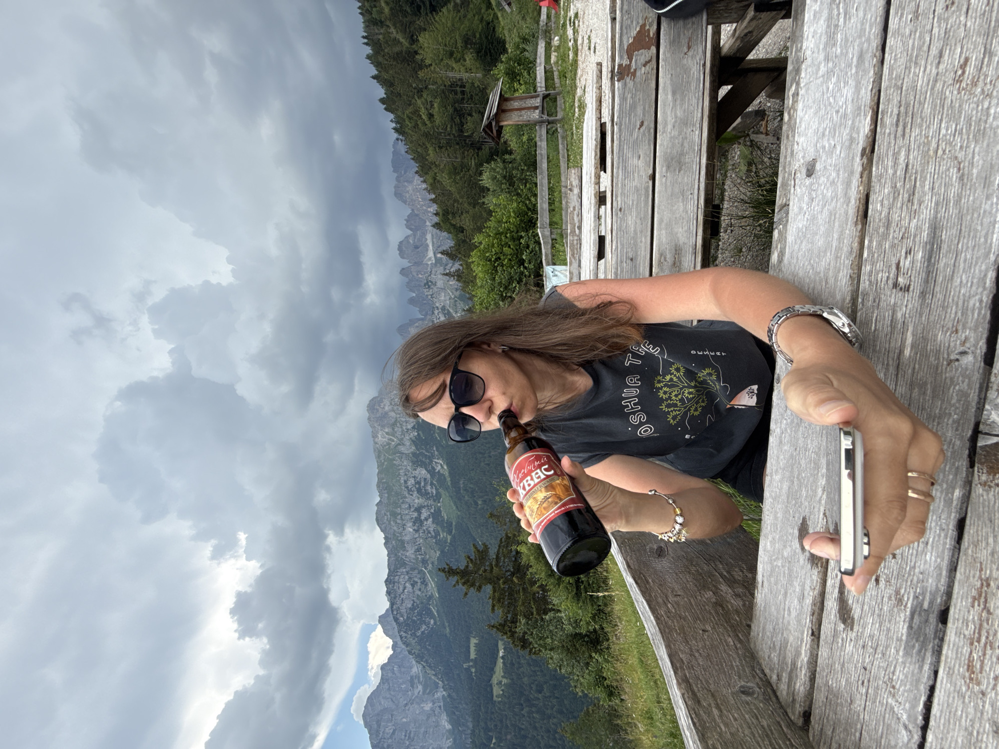 Chilling at Molveno's lakeside benches with Alpine views