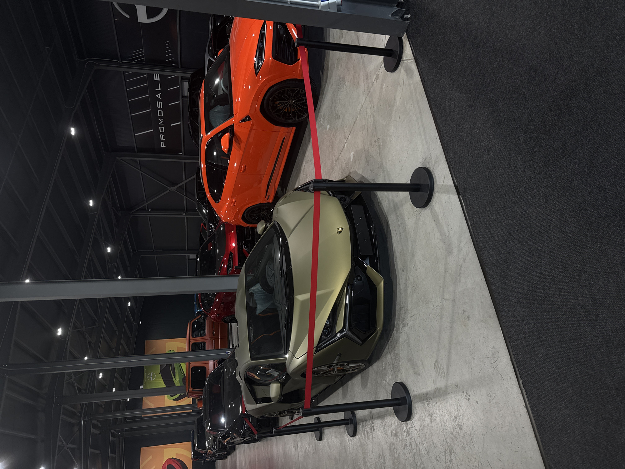High-end car and motorcycle showcase inside a Plovdiv showroom
