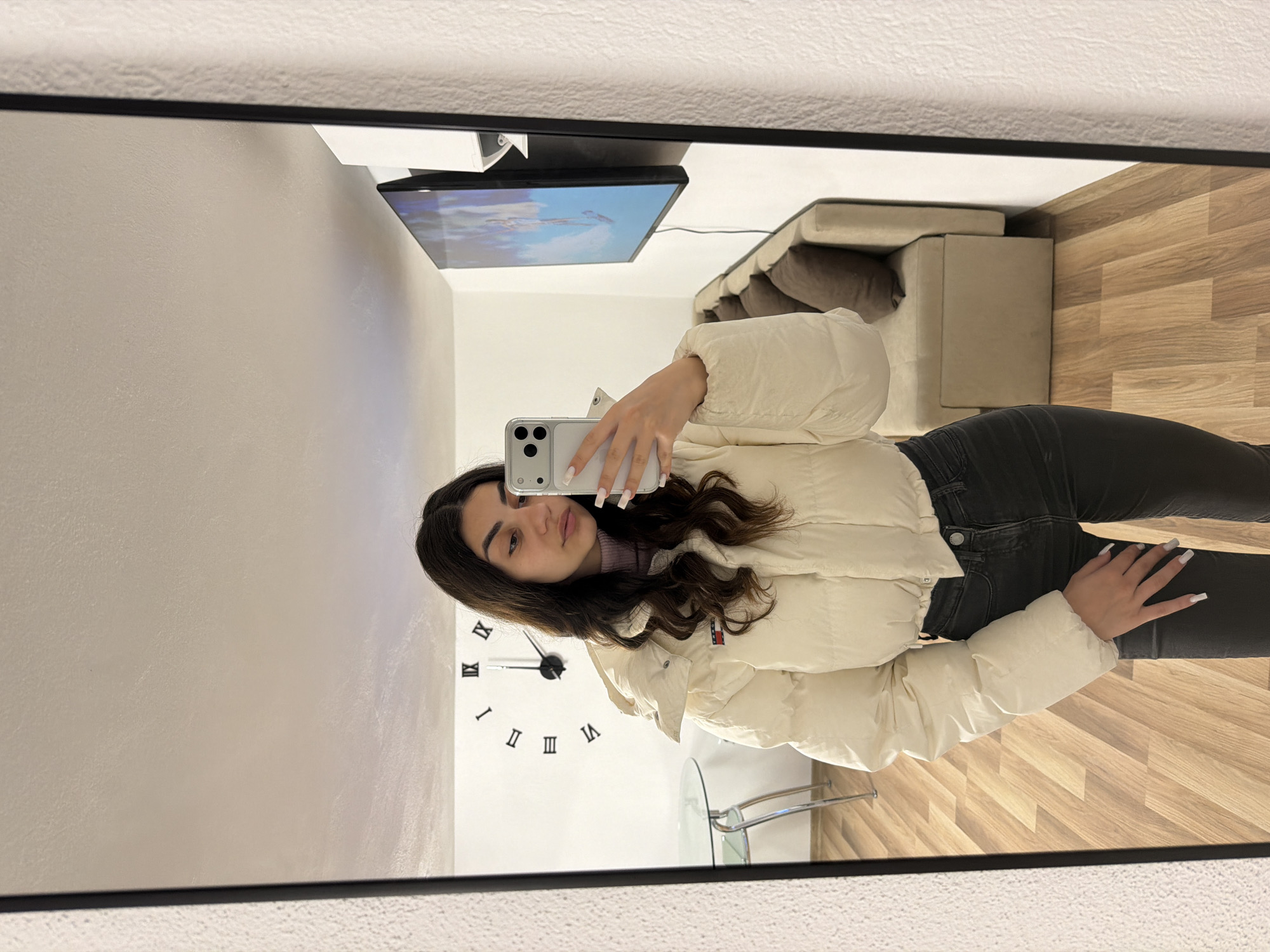 Woman takes mirror selfies in Gabrovo, Bulgaria morning
