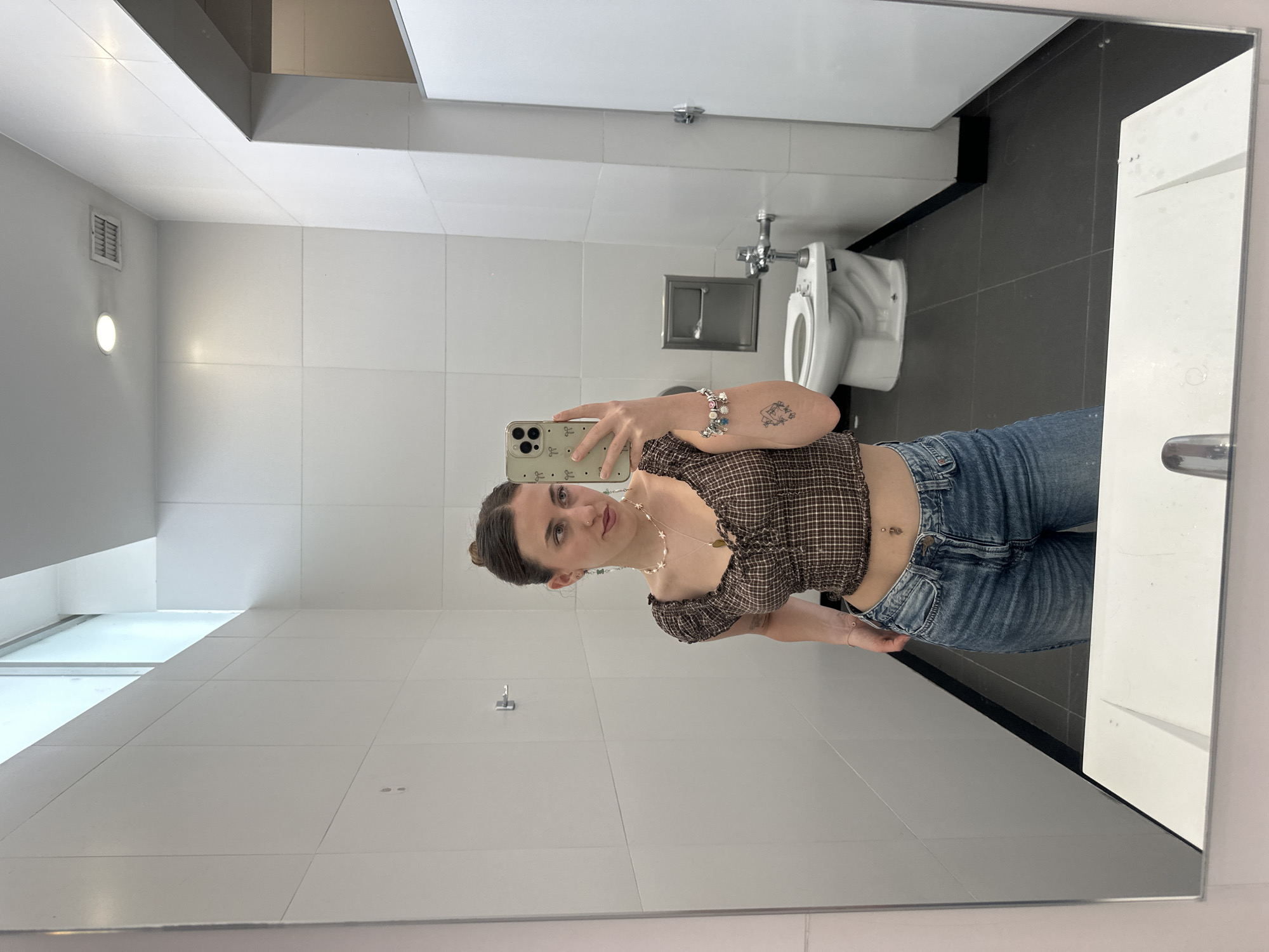 Woman takes bathroom selfies in Mexico City restroom