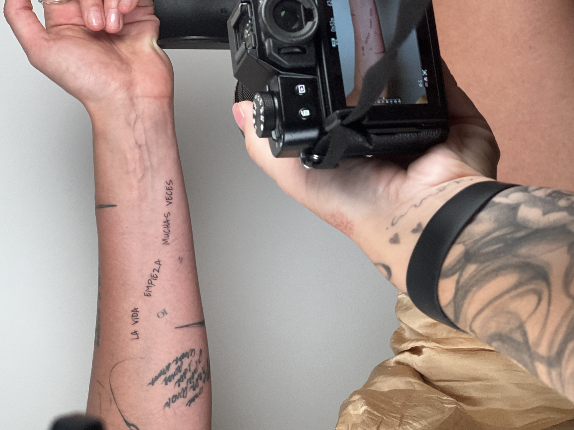 Barcelona tattoo session: fireplace design and Spanish text inked