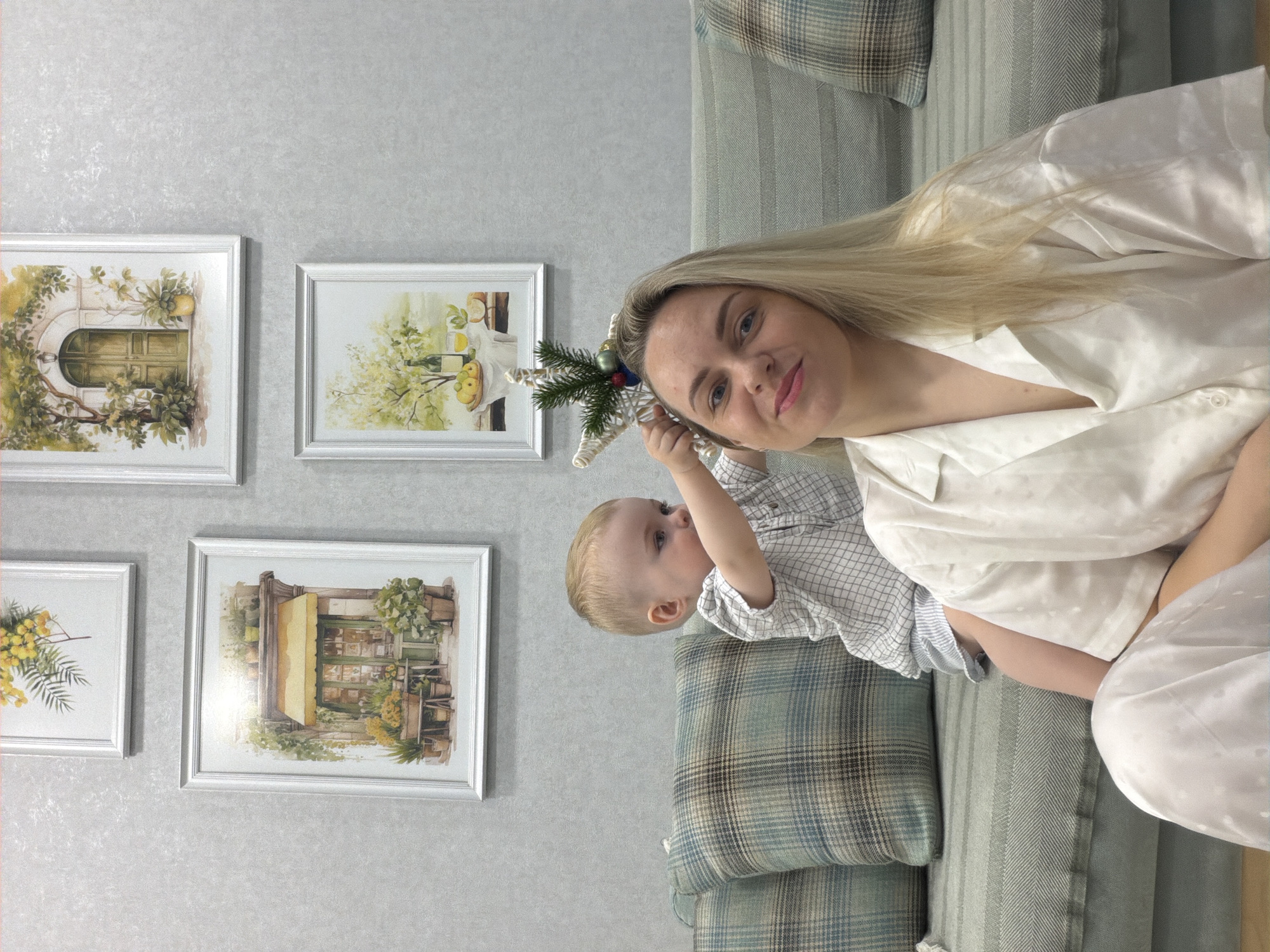 Family moments with blonde woman, toddler, small dog documented Votkinsk