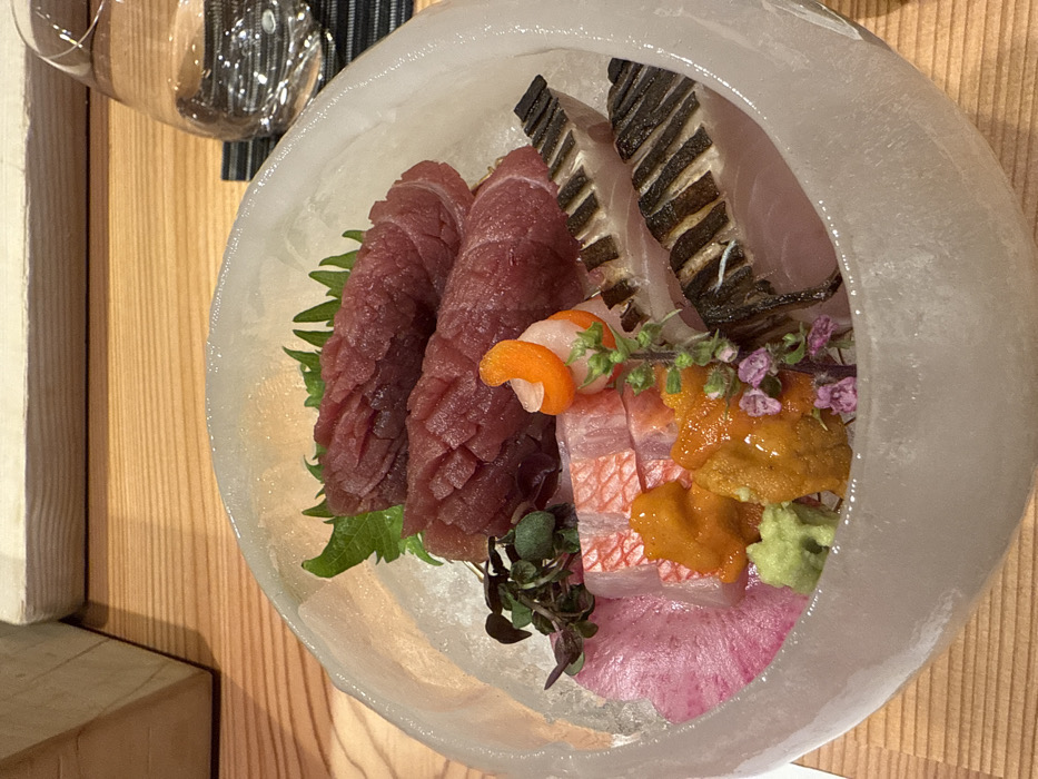 Chef prepares sashimi and matcha service in Minato restaurant