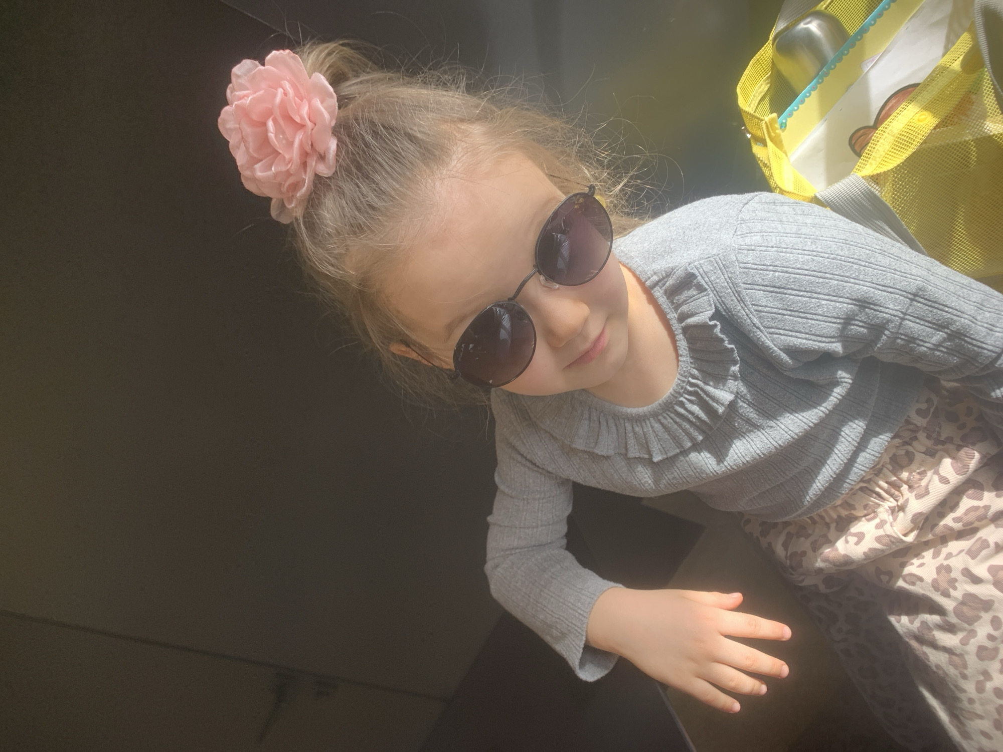 Girl in sunglasses and flower accessory photographed in Izhevsk
