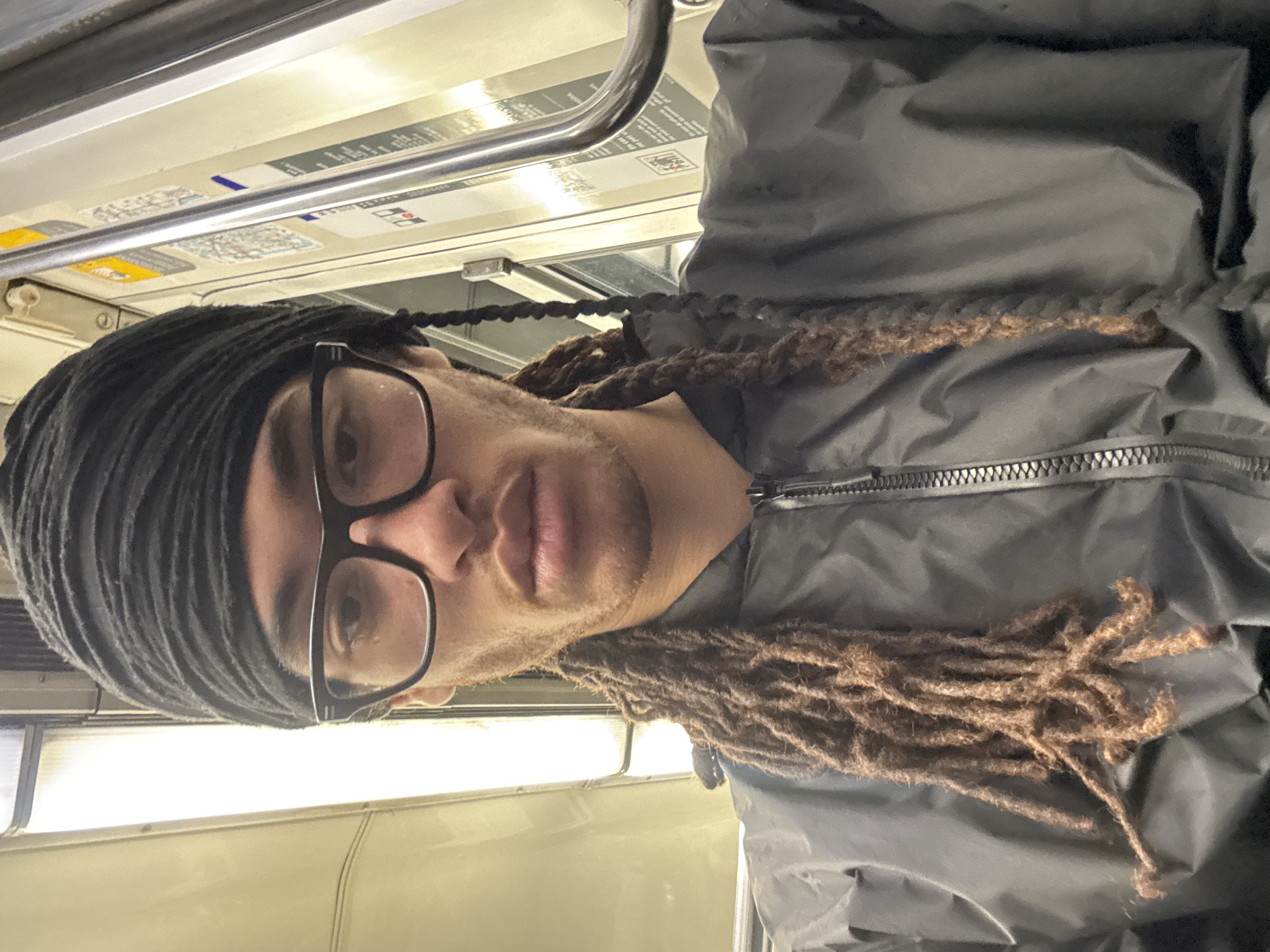 Passengers document ordinary moments aboard Paris Metro subway car