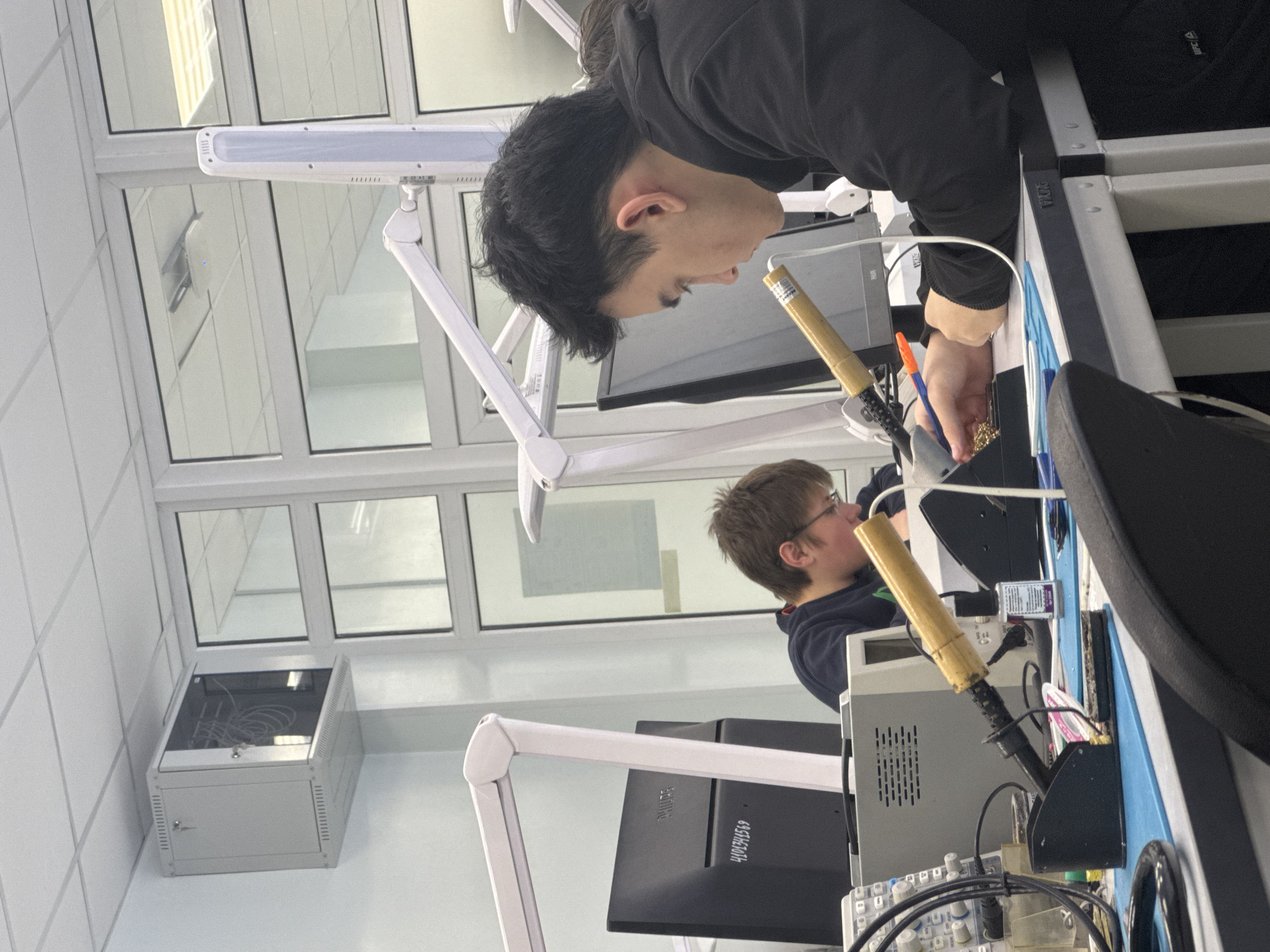 Late-night electronics work captured in Perm laboratory facility