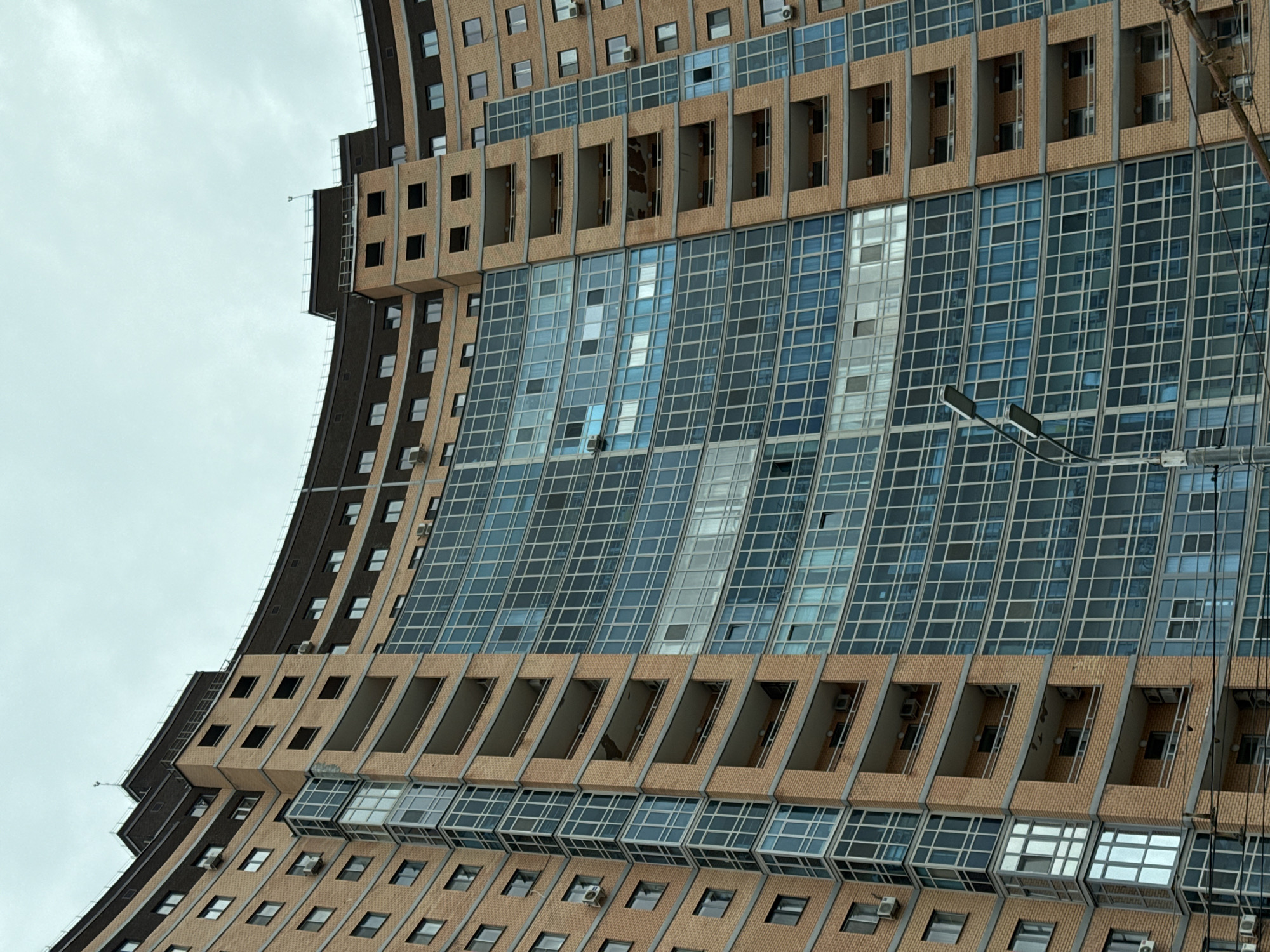 Modernist building with brick-glass facade observed in Kazan