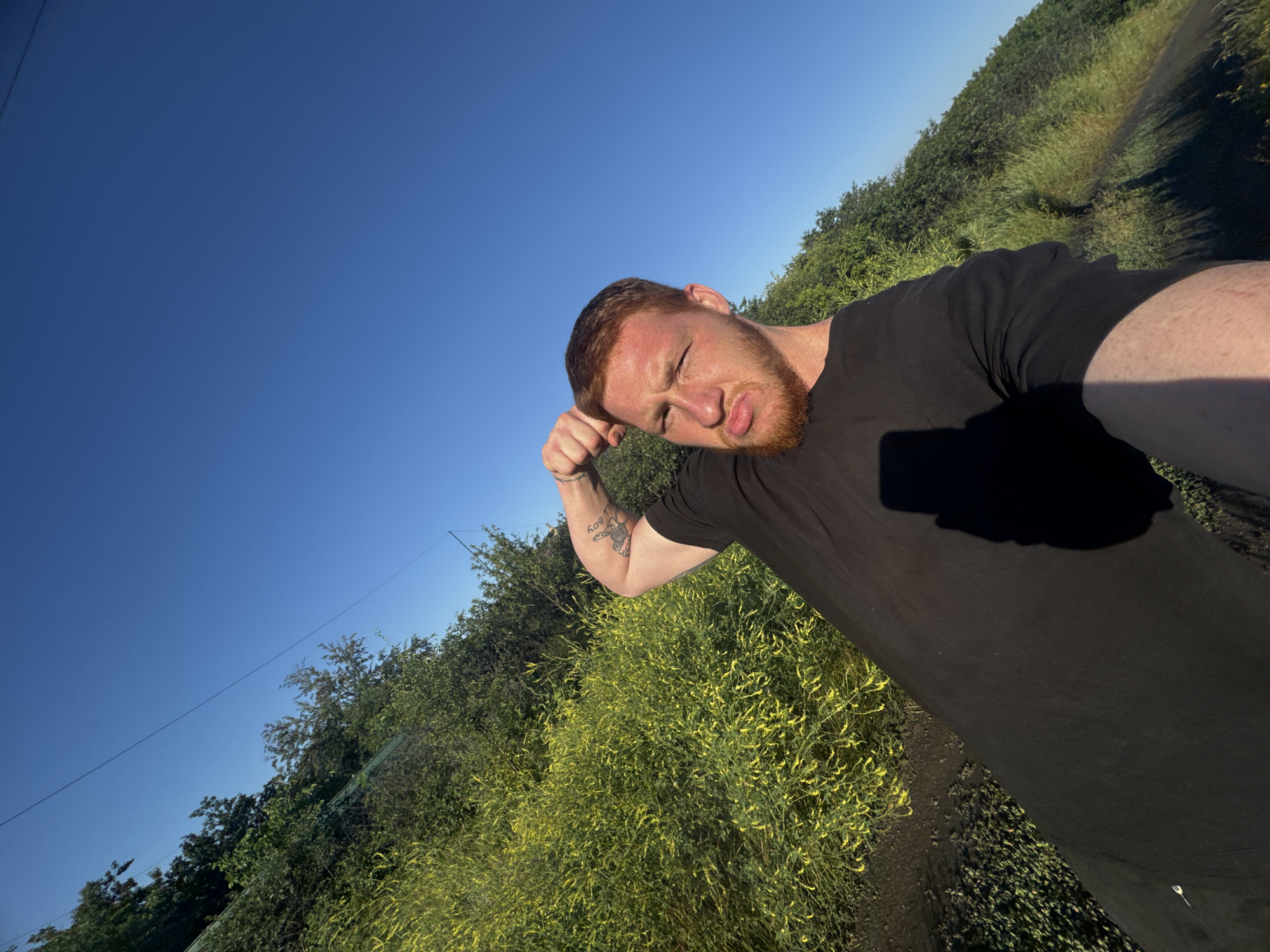 Sunny outdoor hangout with selfies, a dog, and a contest prompt