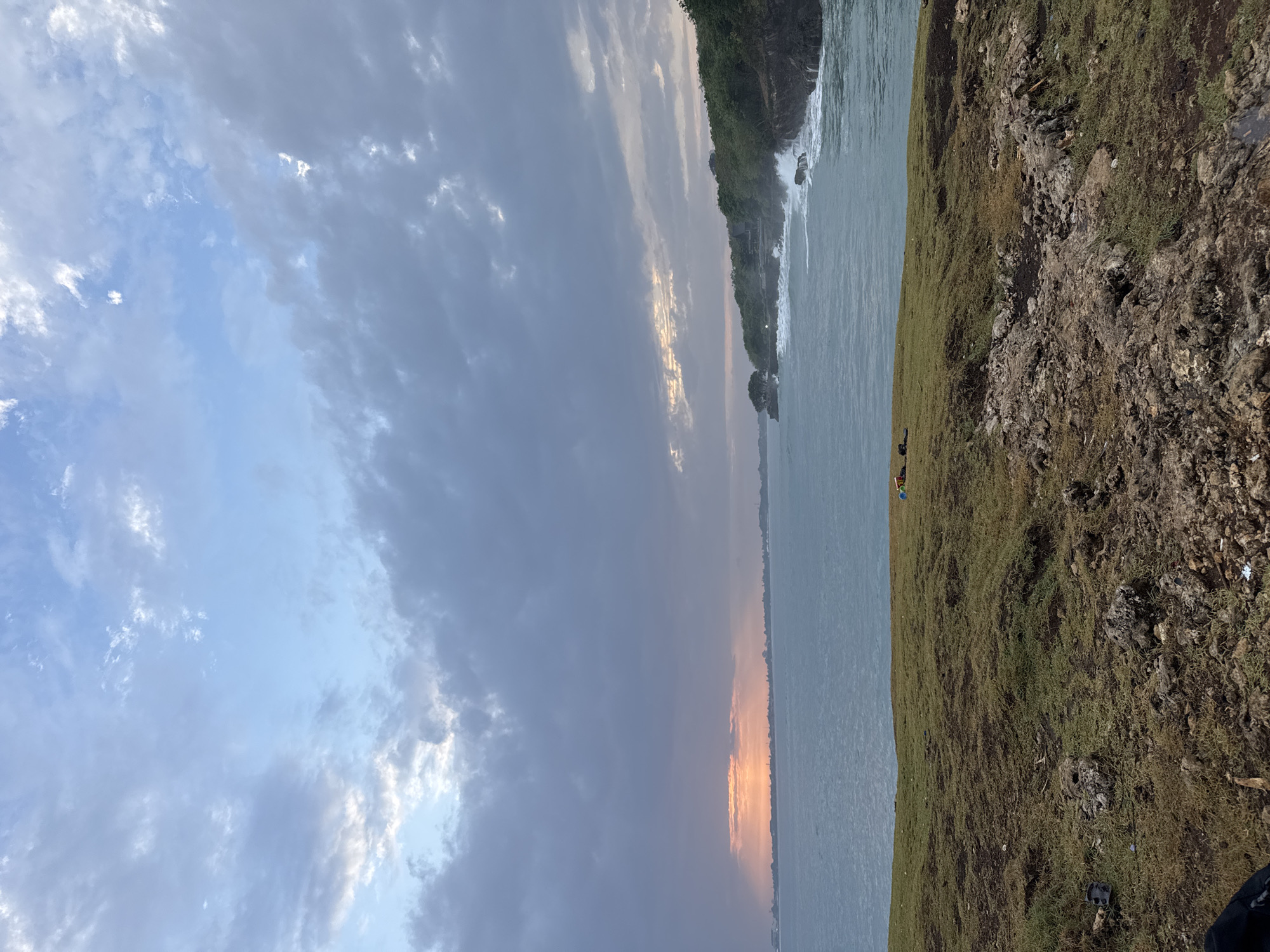 Cloudy sunset captured along Kuta Selatan coastline