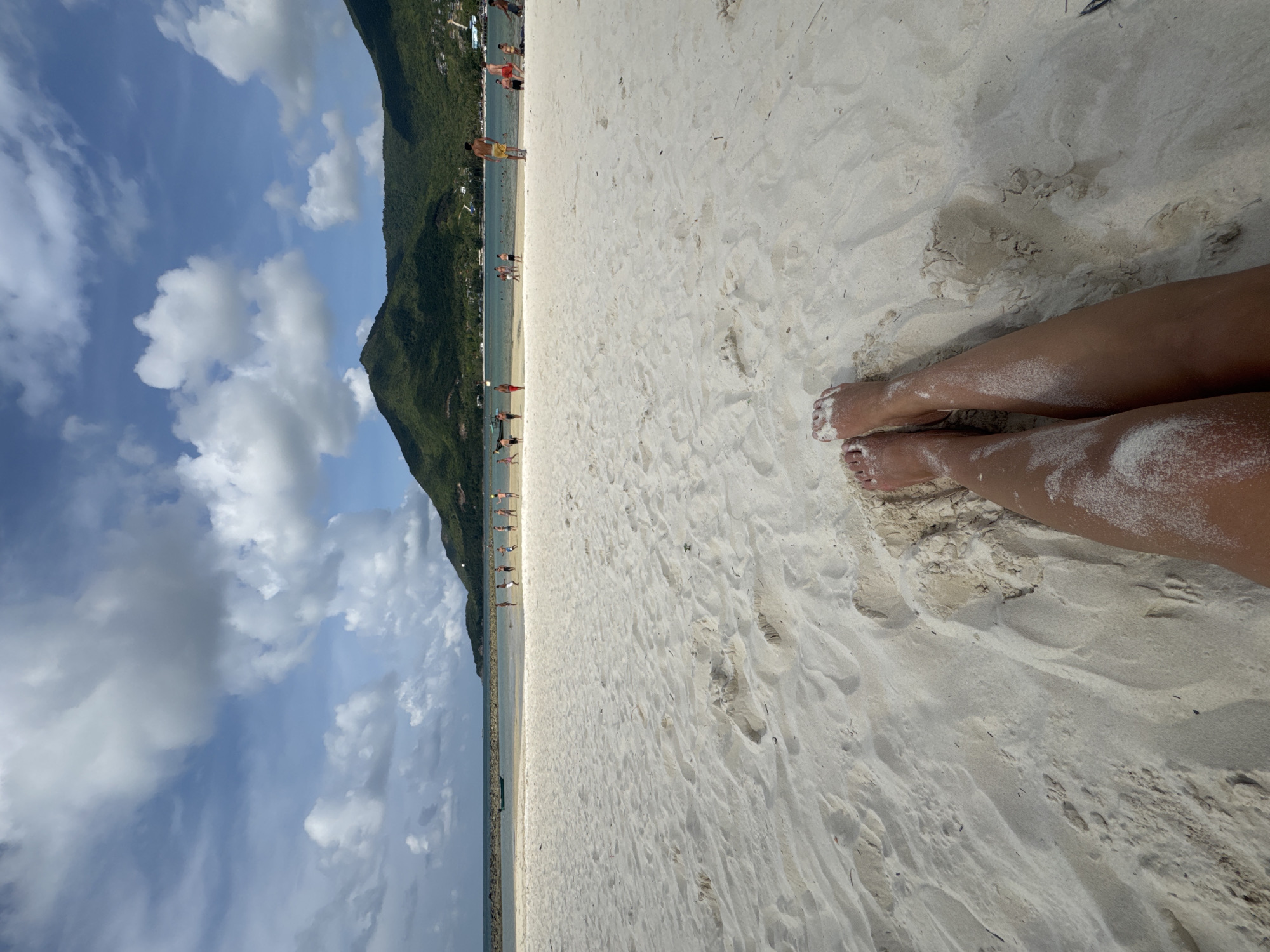 Woman enjoys morning beach time in Baan Chaloklum, Thailand
