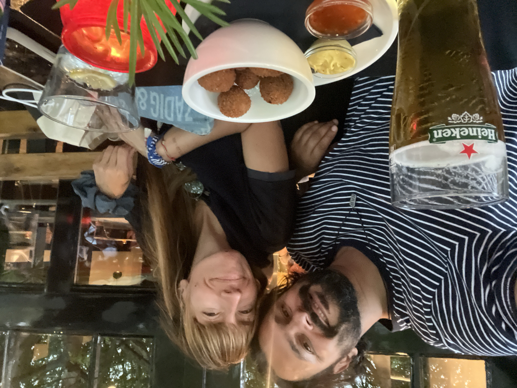 Snacks and smiles at an outdoor table in Delft