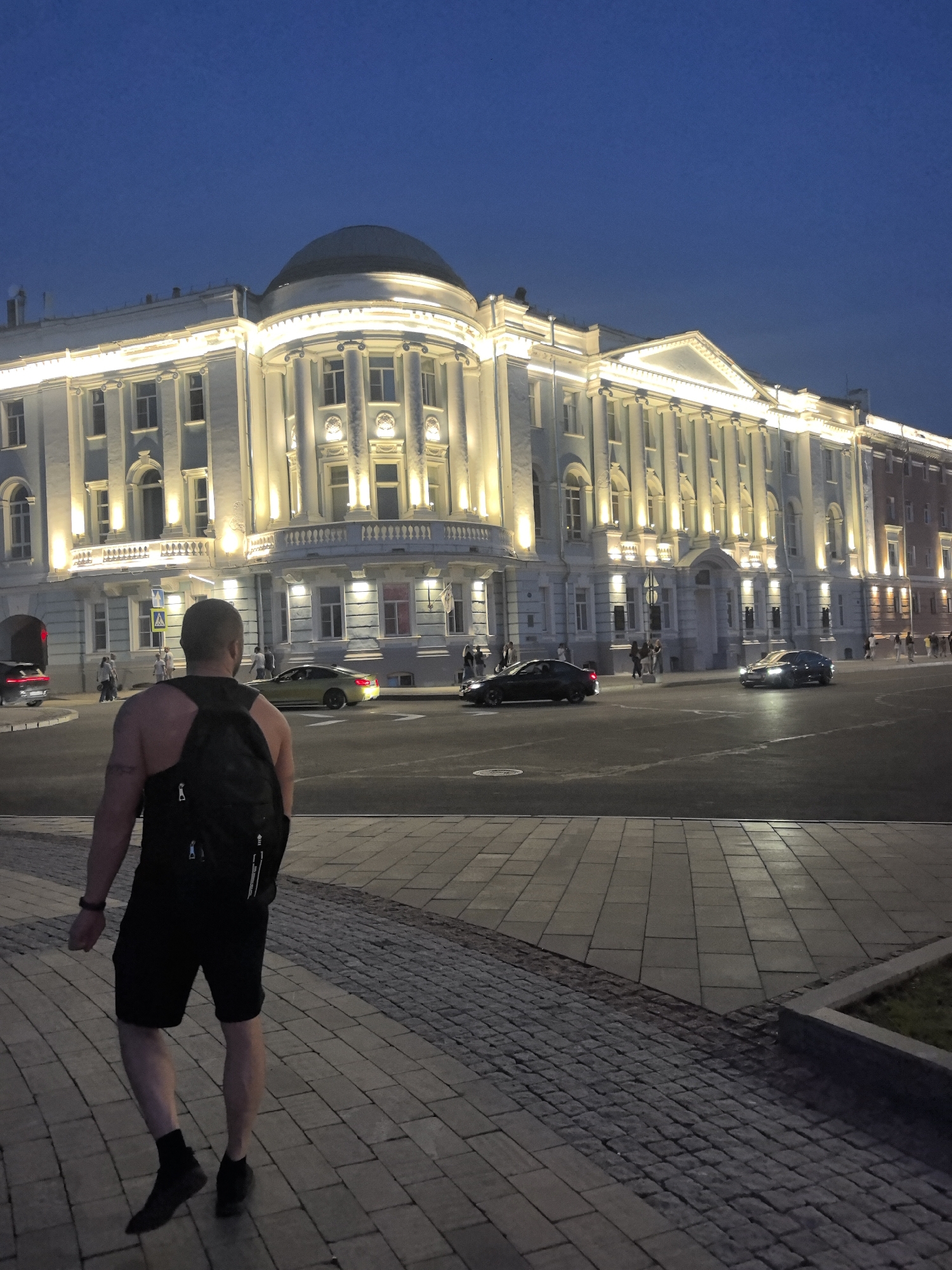 Dusk on the Volga: riverfront crowds and a street guitarist in Nizhny Novgorod