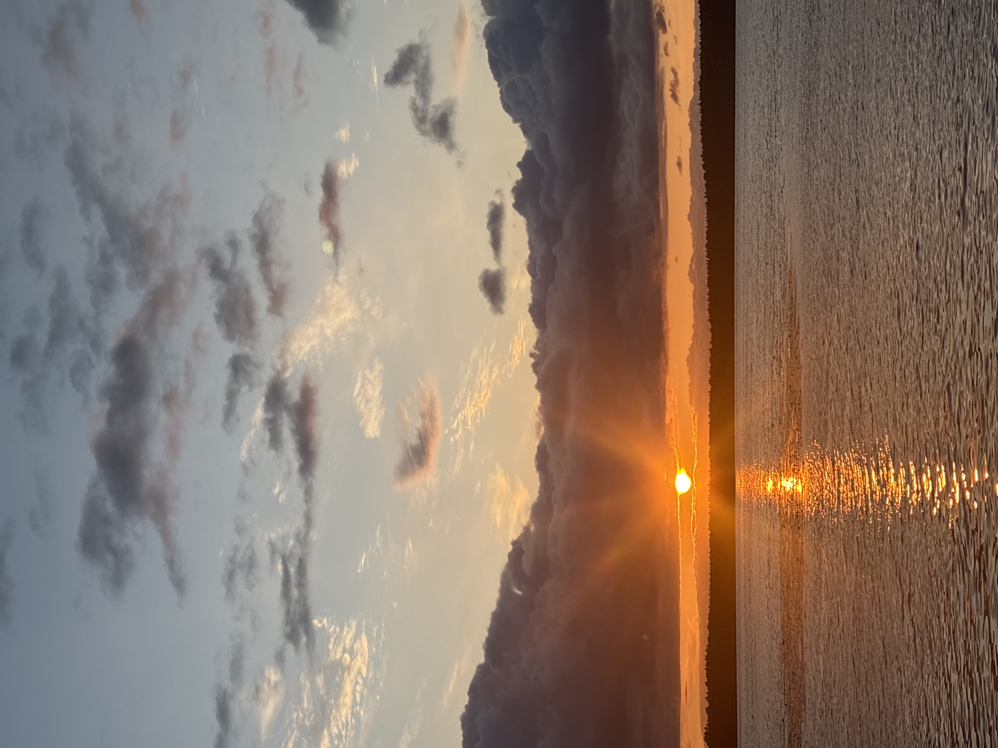 Sunset over water and handmade wreaths, Vsevolozhsk