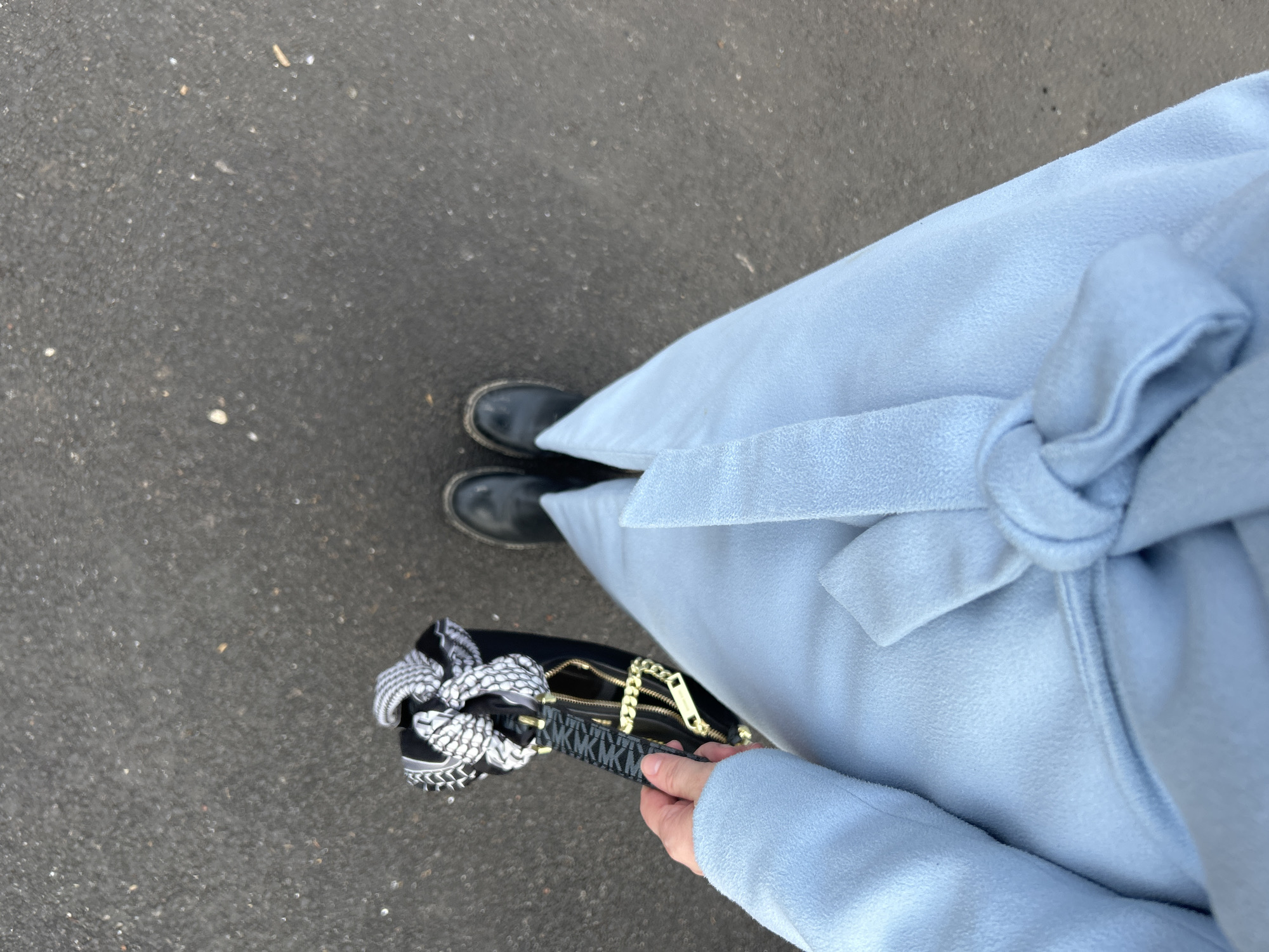 Person in blue coat observed on Ufa street
