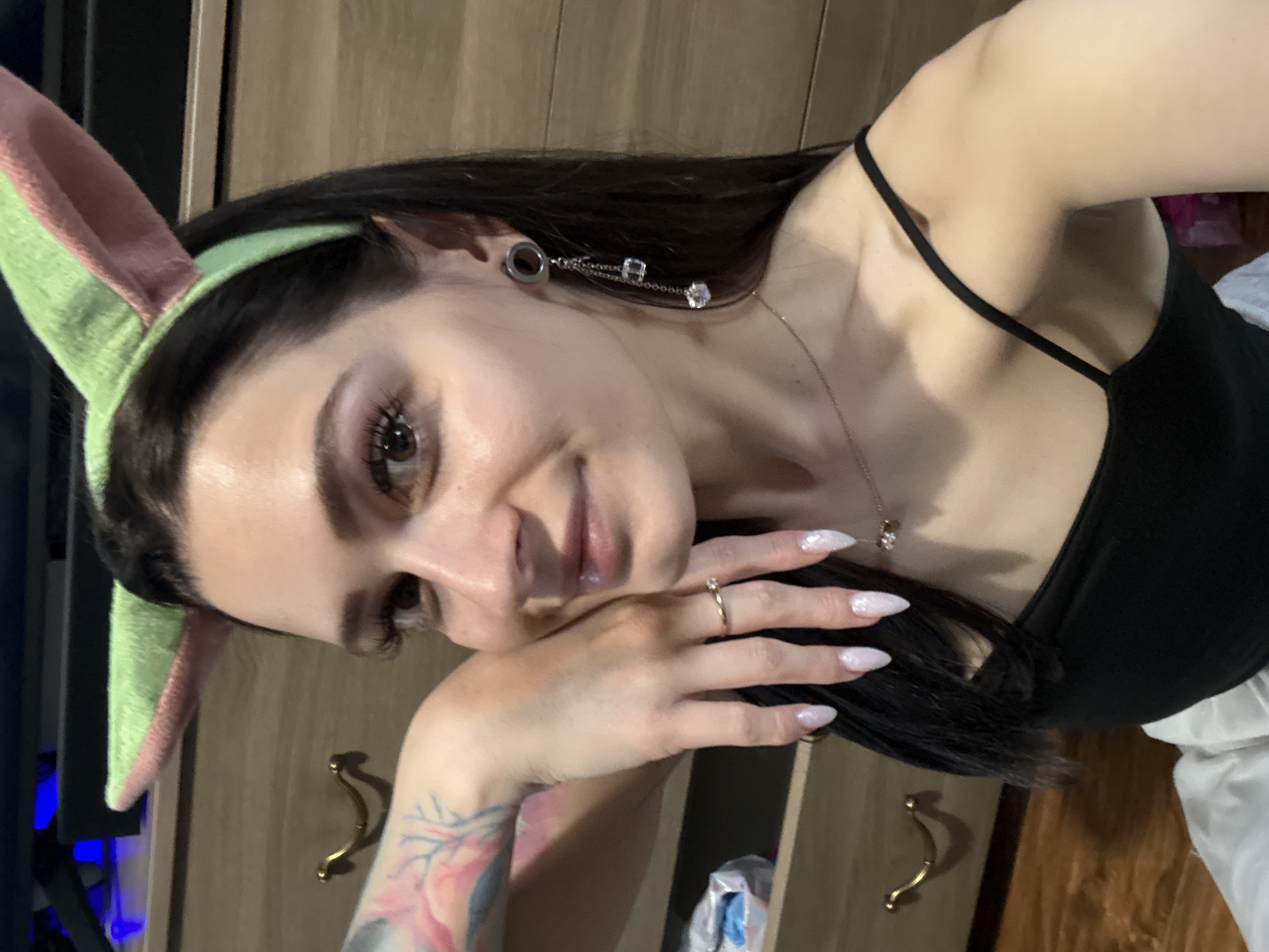 Woman in bunny ears, cosmetics photographed in Reutov