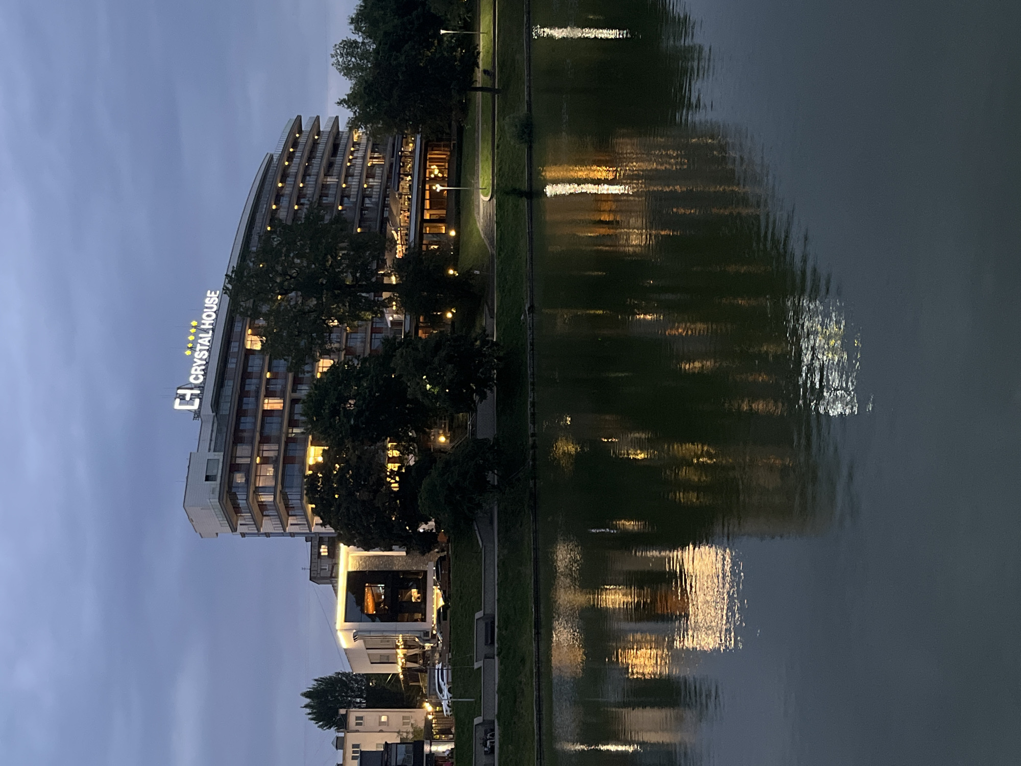Kaliningrad waterfront buildings lit up at dusk