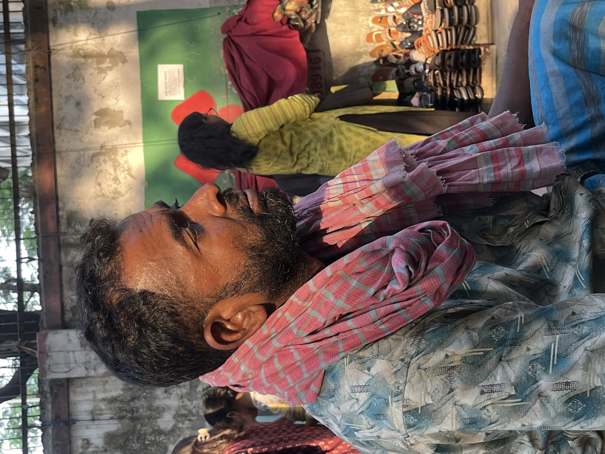 Morning street life documented in Dhaka market district