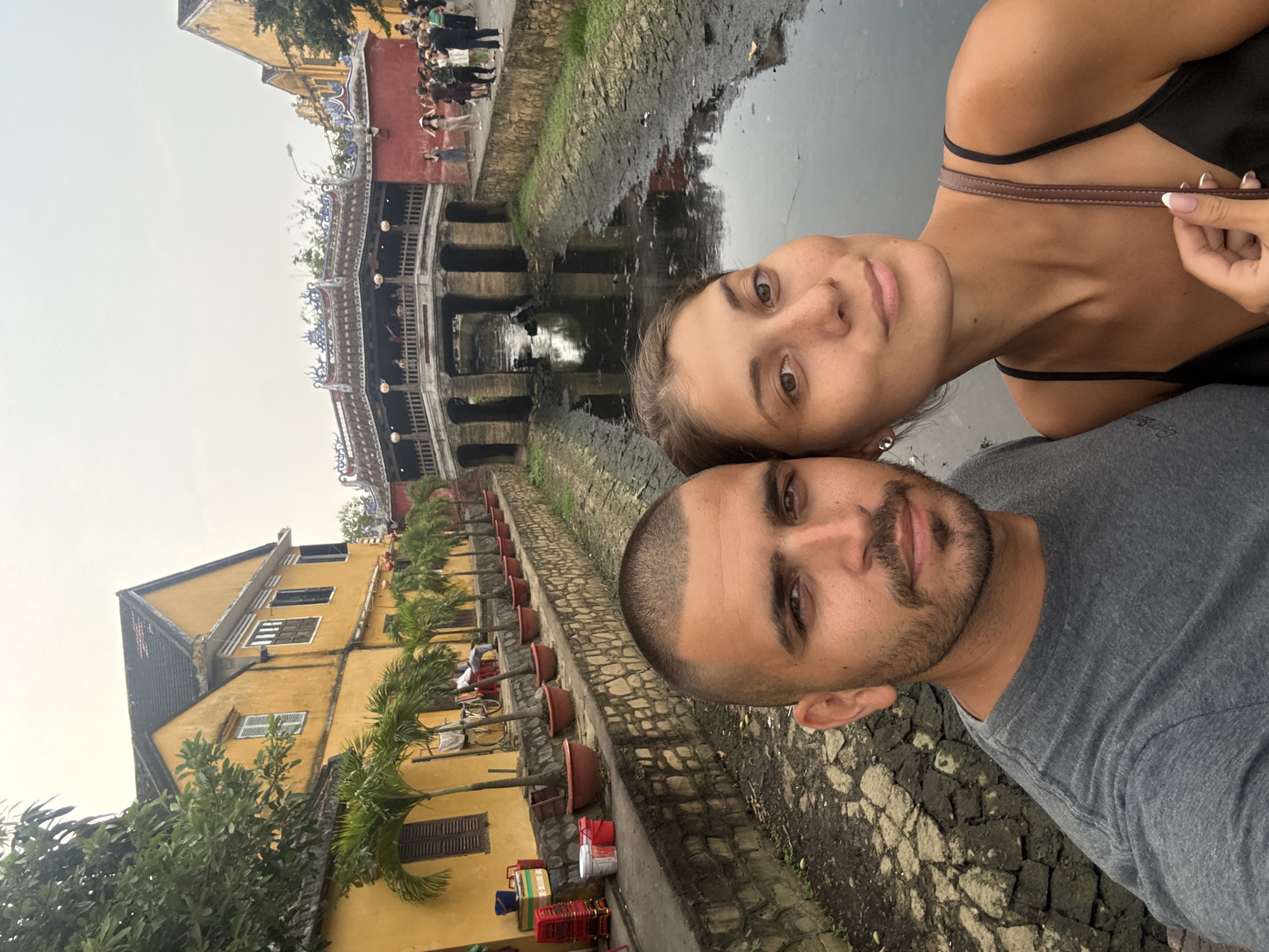 Tourists photograph themselves at Hội An's Japanese Covered Bridge
