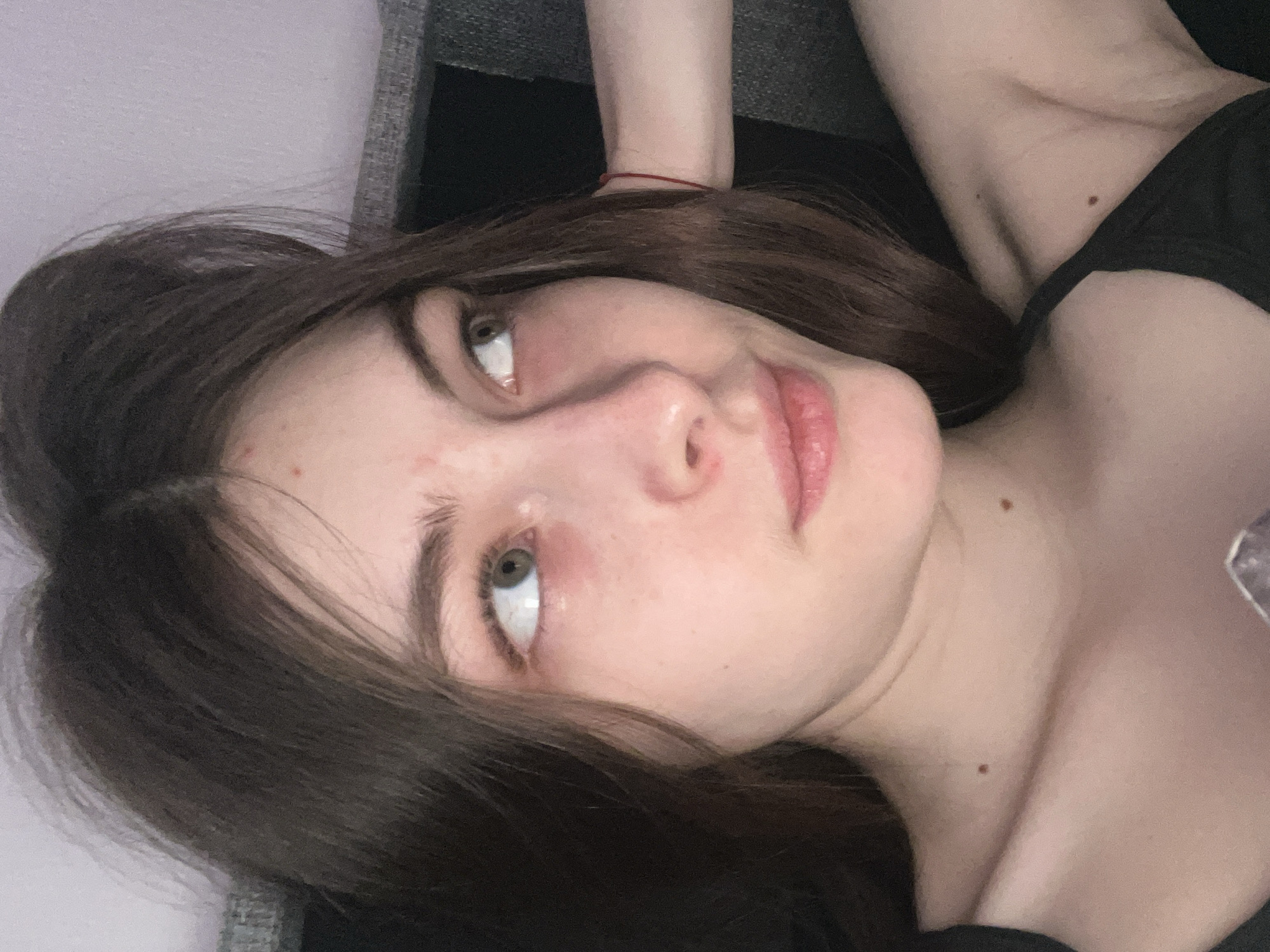 Woman captures multiple selfies in Saint Petersburg bathroom
