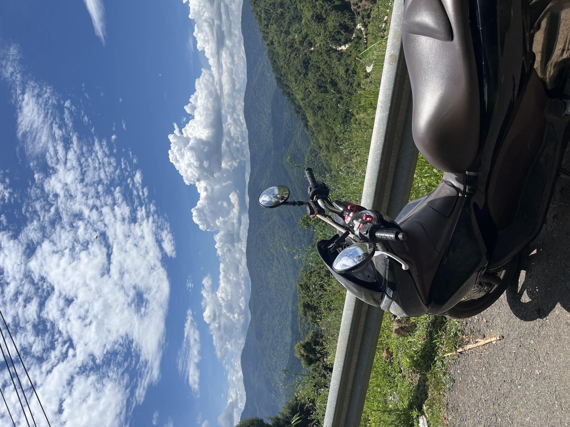 Roadside pause on a scenic mountain route in Son Dien
