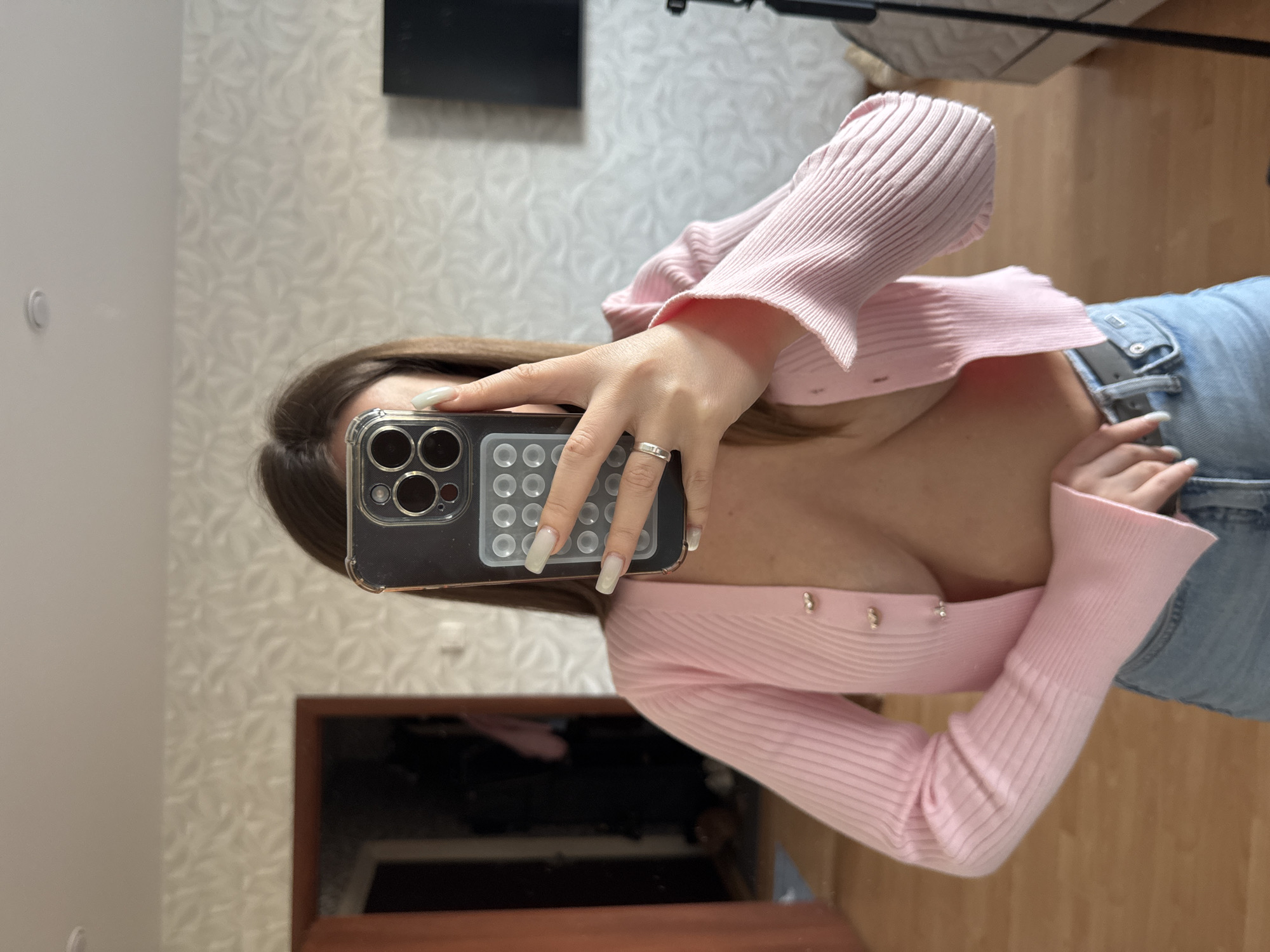 Woman takes mirror selfie in Orekhovo-Zuyevo home