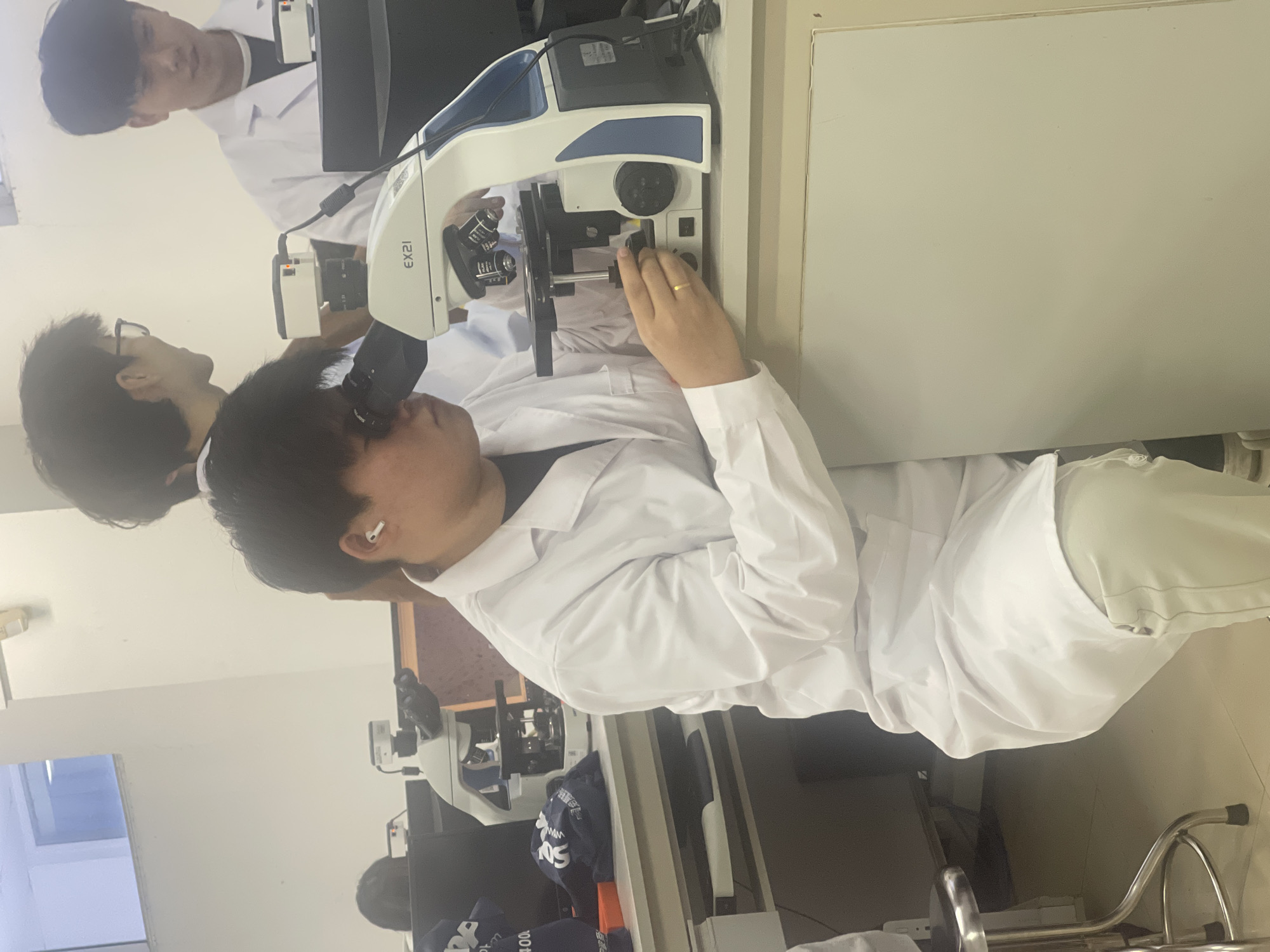 Lab workers conduct research at Chongqing High-tech facility