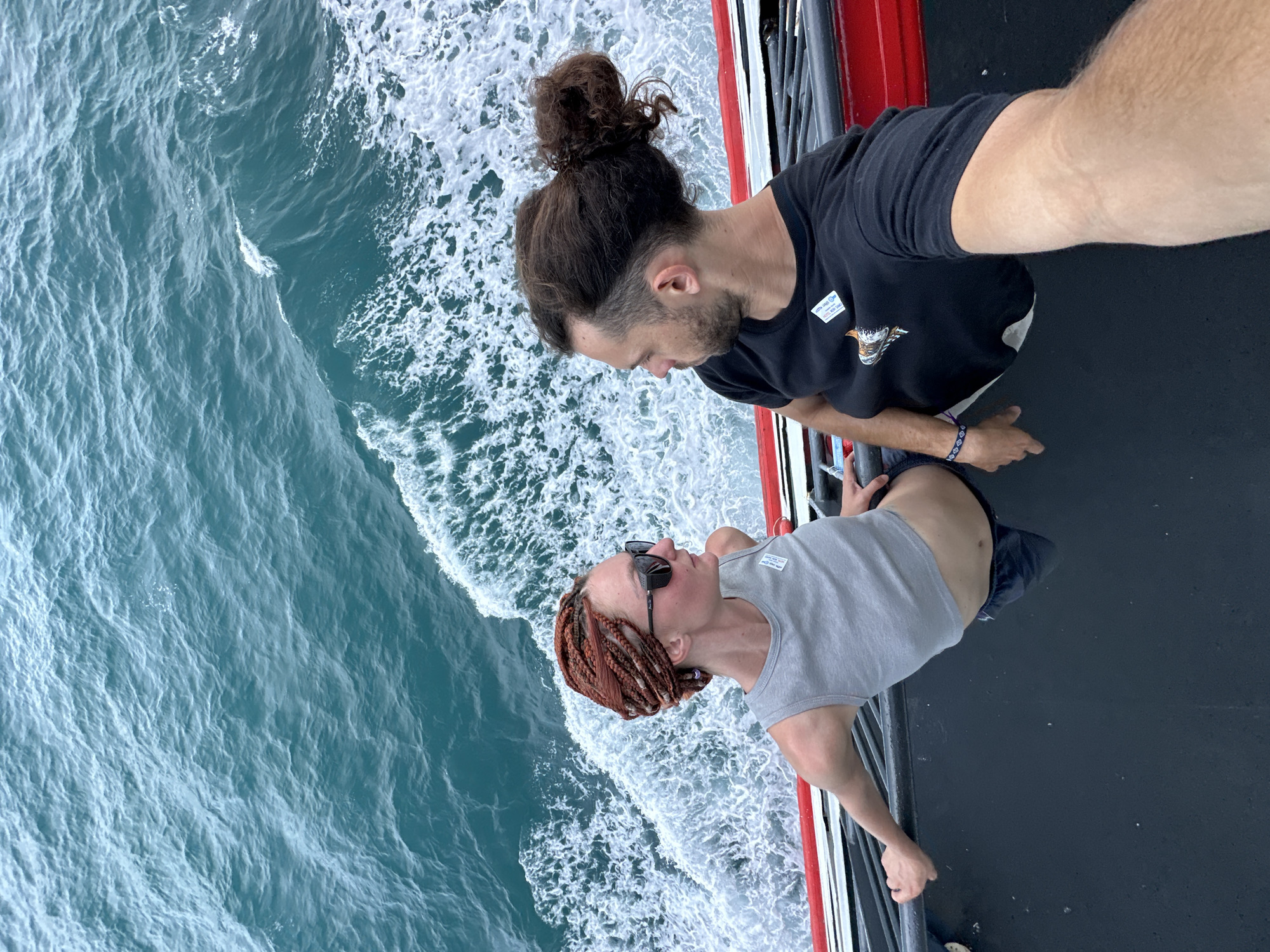 Ferry deck moments on turquoise waters off Nathon, Thailand