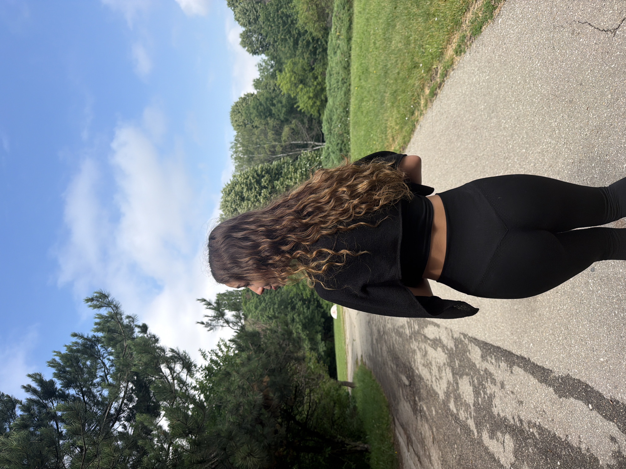 Morning dog walk along a paved park path in Sofia