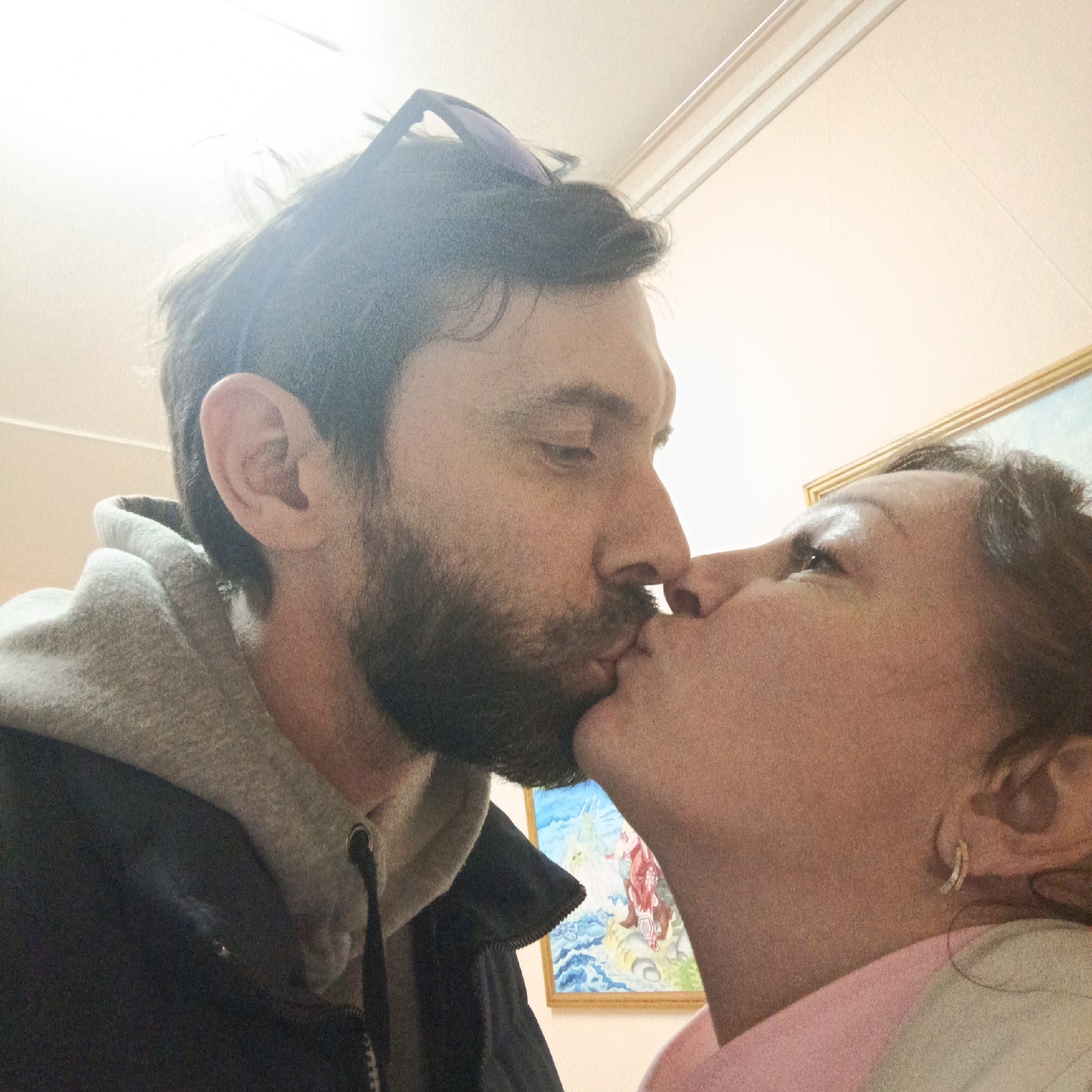 Couple kisses, folklore display photographed in Markovskii Russia