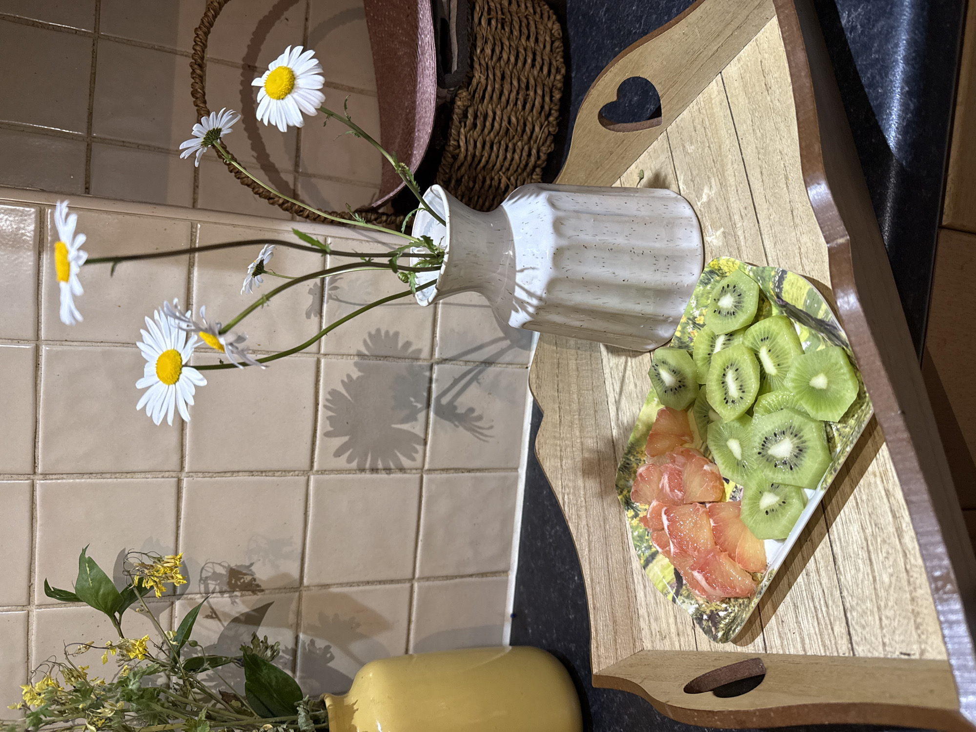 Kitchen still life with fruit and daisies observed Great Yarmouth