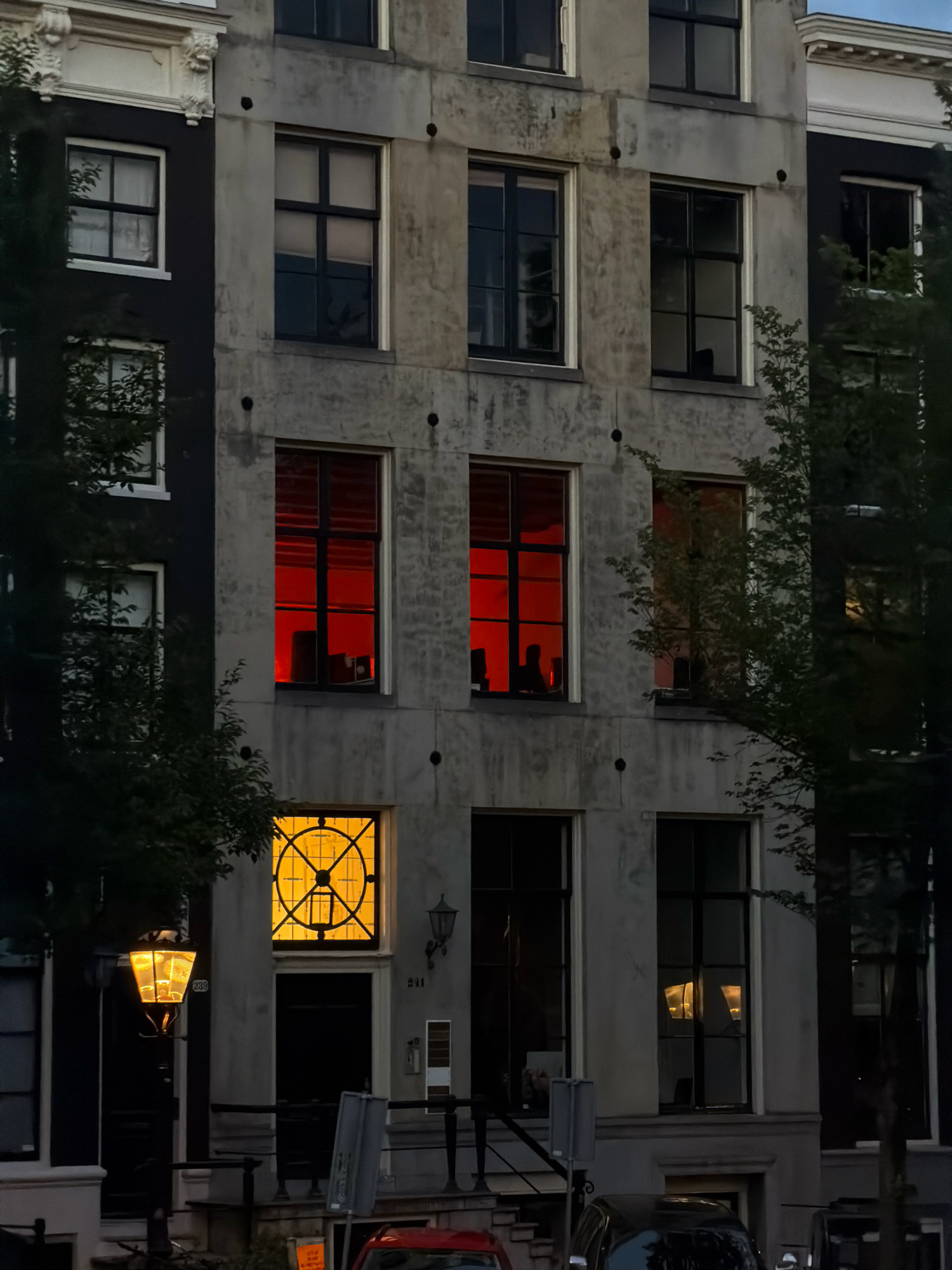 Amsterdam canals and streets at dusk, July 2026
