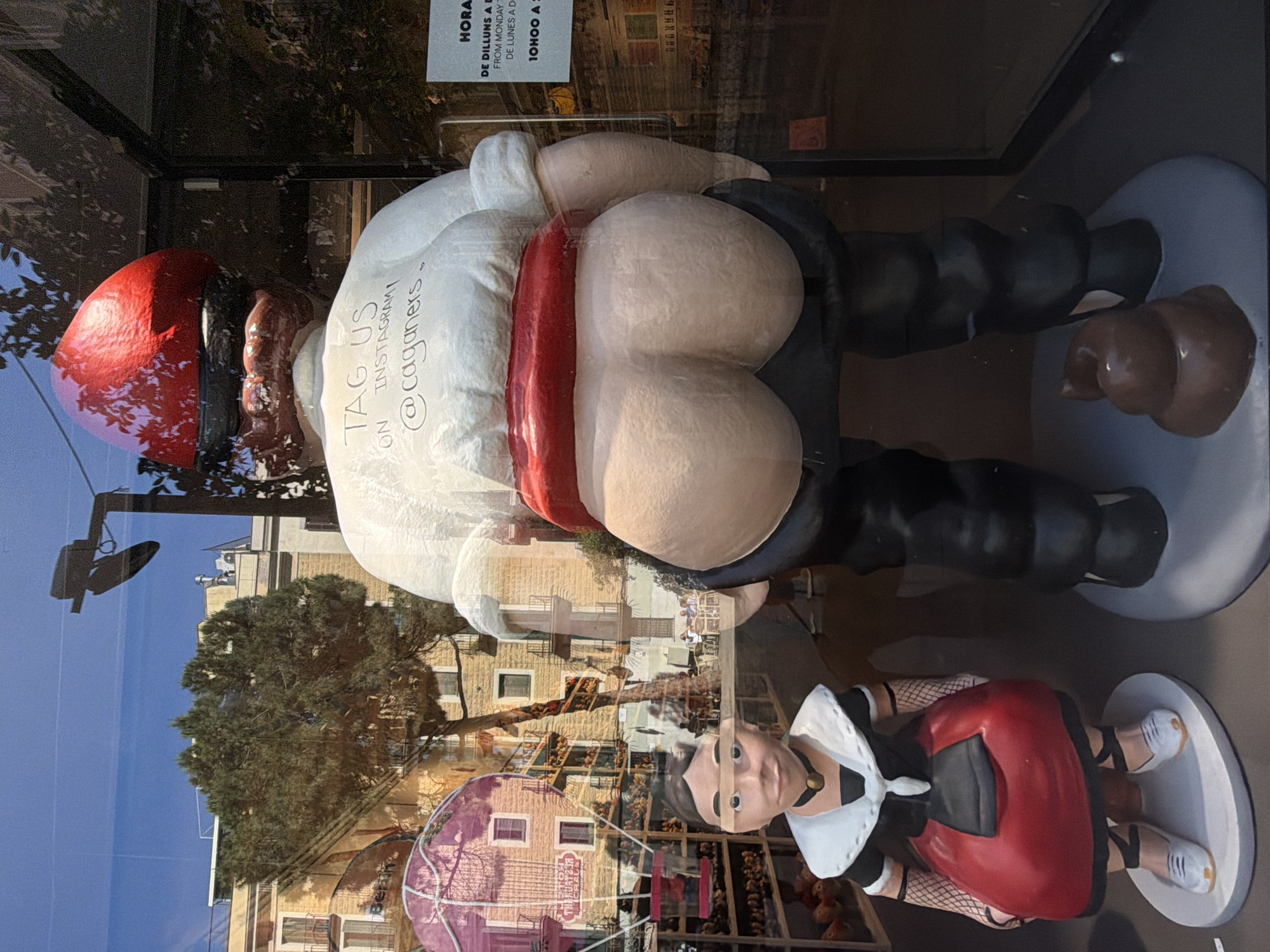 Tourist documents food and culture during Barcelona afternoon stroll